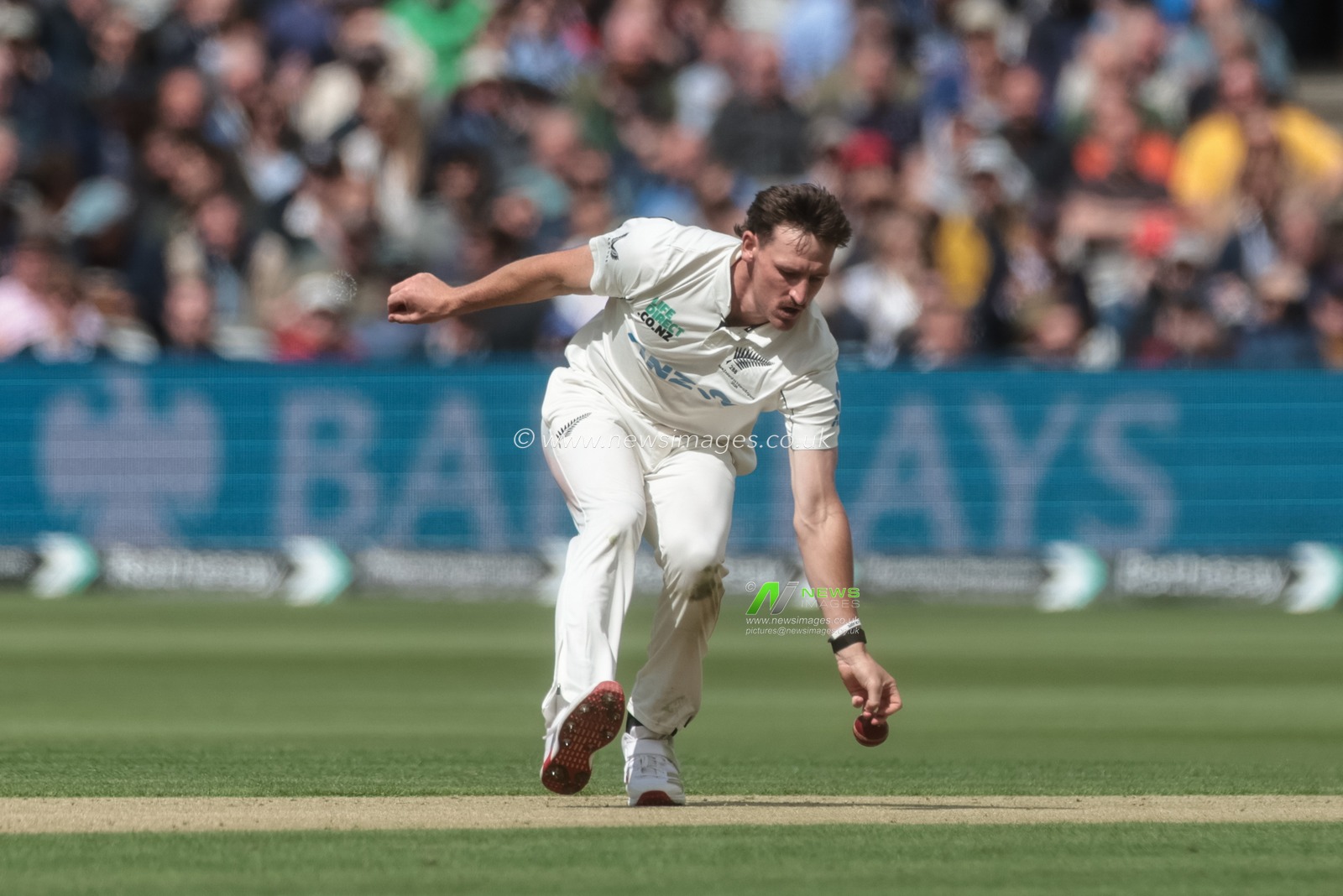 Nathan Smith of New Zealand fields his own ball during the 1st Rothesay Test Match Day 1 England vs New Zealand at Lords, London, United Kingdom on 04 June 2026

(Photo by Mark Cosgrove/News Images)