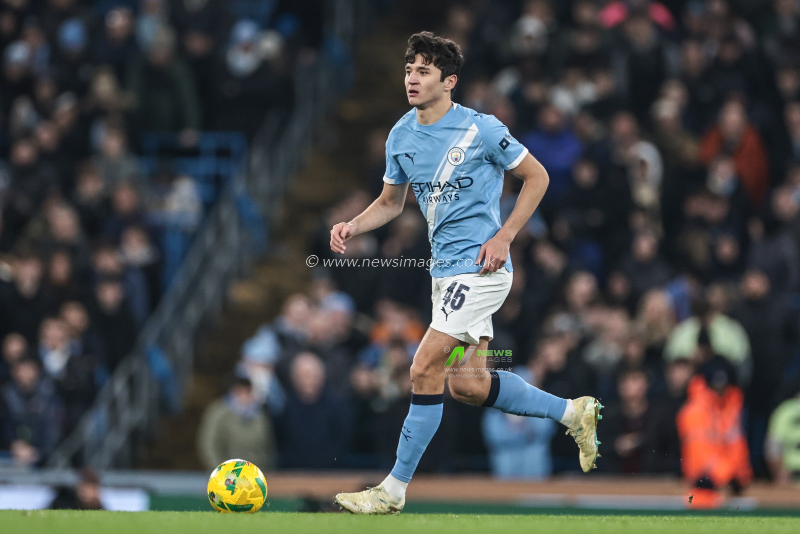 Abdukodir Khusanov of Manchester City breaks with the ball during the Carabao Cup Semi-Final second leg match Manchester City vs Newcastle United at Etihad Stadium, Manchester, United Kingdom, 4th February 2026

(Photo by Mark Cosgrove/News Images)