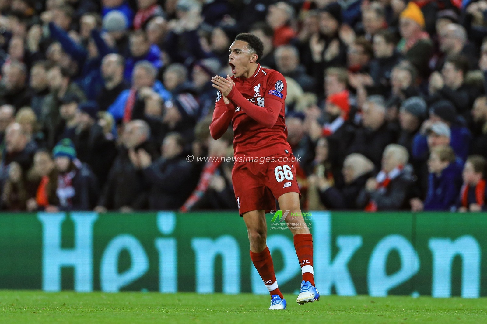 11th December 2018, Anfield, Liverpool, England; UEFA Champions League, Liverpool v Napoli ;  Trent Alexander-Arnold (66) of Liverpool celebrates Mohamed Salah (11) of Liverpool goal to make it 1-0 


  Credit: Mark Cosgrove/News Images
