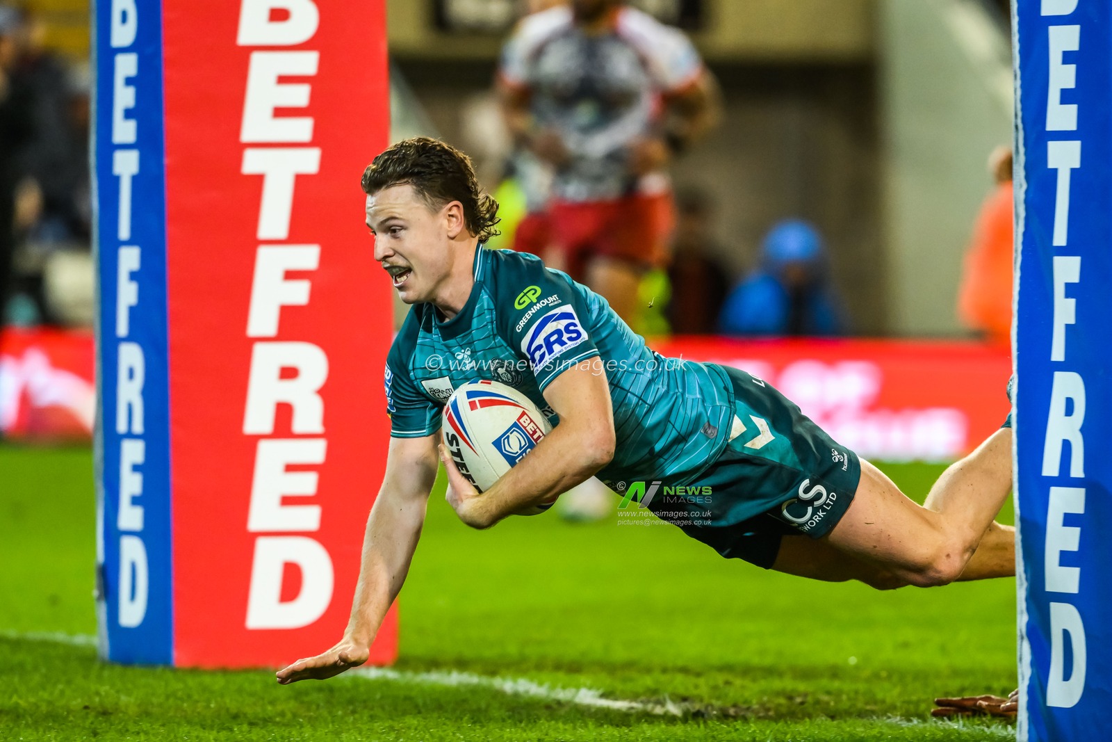 Jai Field #1 of Wigan Warriors goes over for a try during the Betfred Super League Round 7 match Leigh Leopards vs Wigan Warriors at Leigh Sports Village, Leigh, United Kingdom, 30th March 2023

(Photo by Craig Thomas/News Images)