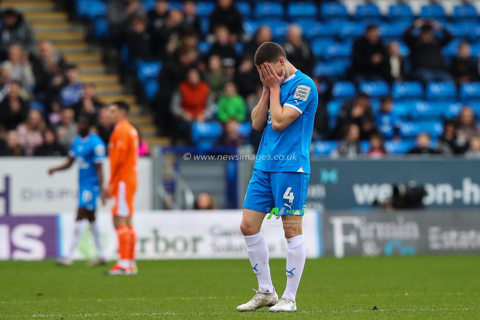 Ronnie Edwards of Peterborough United reacts during the Sky Bet League 1 match Peterborough United vs Blackpool at Weston Homes Stadium, Peterborough, United Kingdom, 17th February 2024

(Photo by Gareth Evans/News Images)