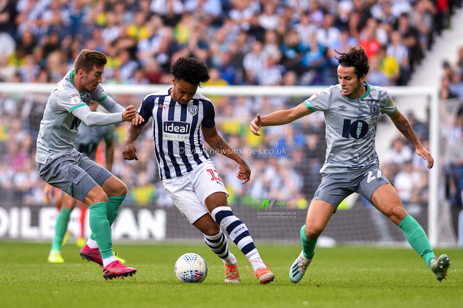 31st August 2019, The Hawthorns, West Bromwich, England; Sky Bet Championship Football, West Bromwich Albion vs Blackburn Rovers ; Matheus Pereira (12) of West Bromwich Albion under pressure from Joe Rothwell (08) of Blackburn and Lewis Travis (27) of Blackburn 


Credit: Gareth Dalley/News Images

English Football League images are subject to DataCo Licence