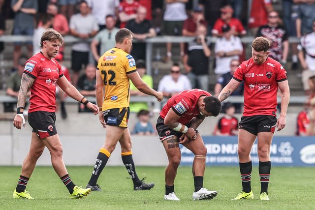 Jayden Nikorima of Salford Red Devils holds his injured arm during the Betfred Super League Round 18 match Salford Red Devils vs Castleford Tigers at Salford Community Stadium, Eccles, United Kingdom, 13th July 2025

(Photo by Alfie Cosgrove/News Images)