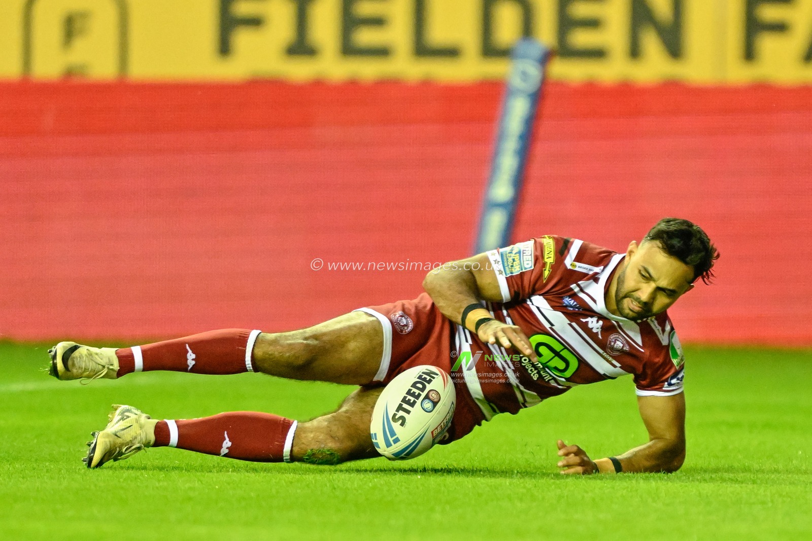 Bevan French of Wigan Warriors goes over for a try to make it 16-6 Wigan during the Betfred Super League Round 16 match Wigan Warriors vs Leigh Leopards at DW Stadium, Wigan, United Kingdom, 5th July 2024

(Photo by Cody Froggatt/News Images)