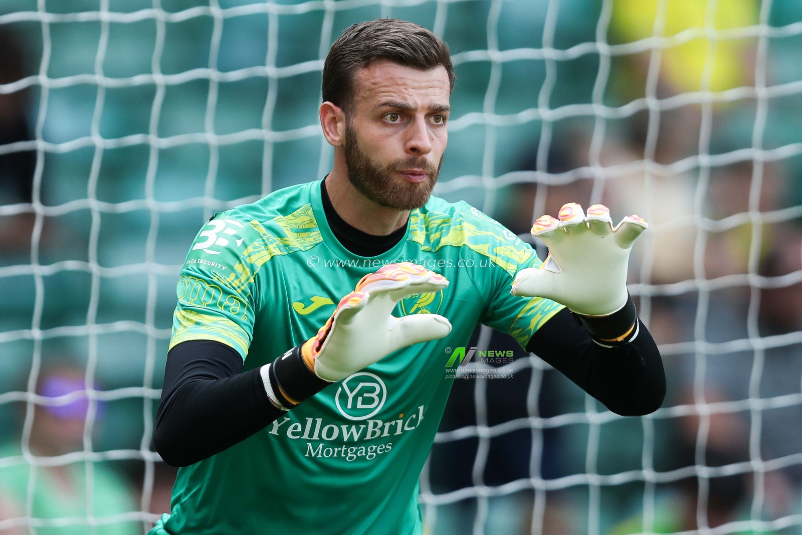 Angus Gunn of Norwich City warms up prior to the Sky Bet Championship match Norwich City vs Blackburn Rovers at Carrow Road, Norwich, United Kingdom, 17th August 2024

(Photo by Izzy Poles/News Images)