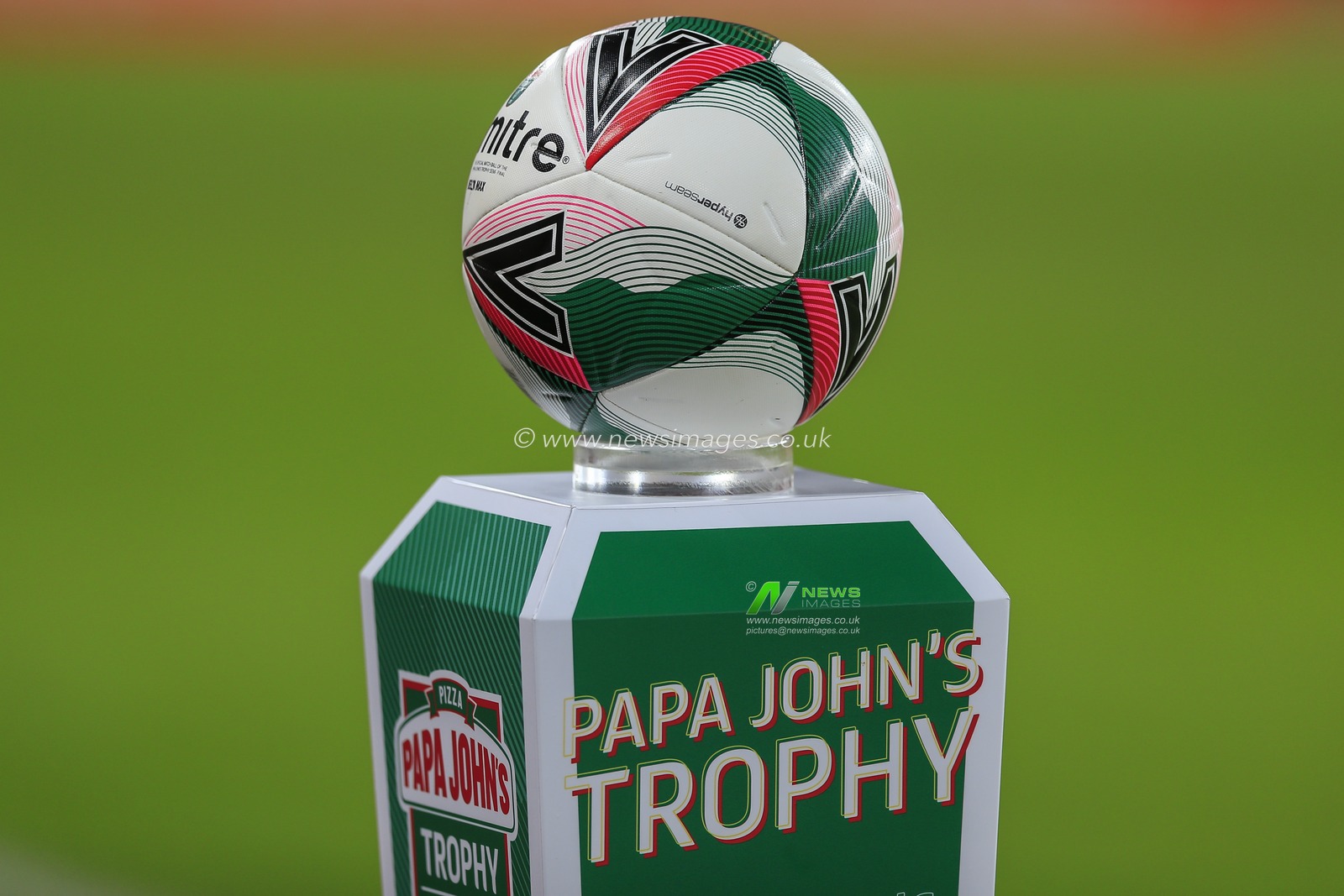 The official match ball on a Papa John's Trophy branded plinth