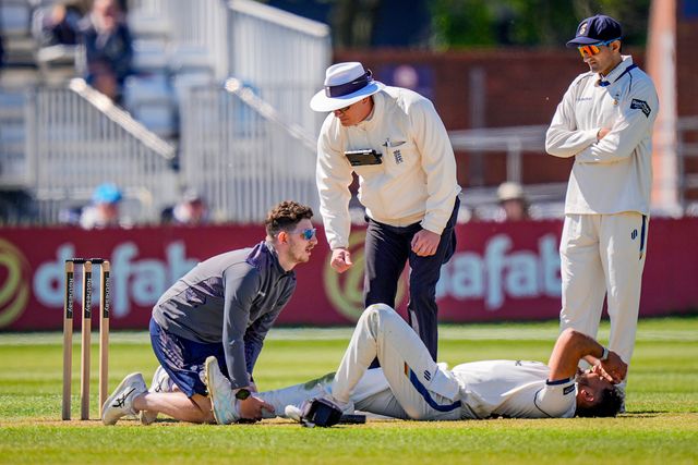 Anuj Dal of Derbyshire receives treatment before leaving the field of play injured during the County Championship Division Two Derbyshire vs Gloucestershire at The Central Co-Op County Ground, Derby, United Kingdom on 24 April 2026

(Photo by Maynard Manyowa/News Images)