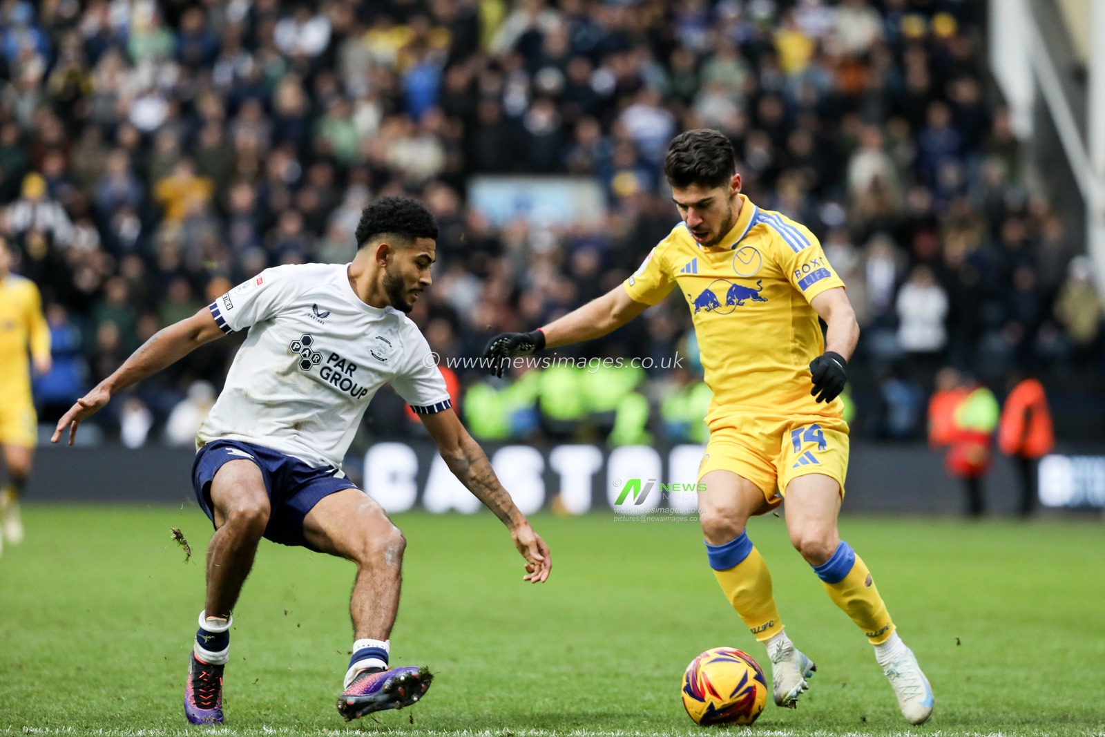 Manor Solomon of Leeds United cuts inside sending Kaine Kesler Hayden of Preston North End the other way during the Sky Bet Championship match Preston North End vs Leeds United at Deepdale, Preston, United Kingdom, 14th December 2024

(Photo by Jorge Horsted/News Images)
