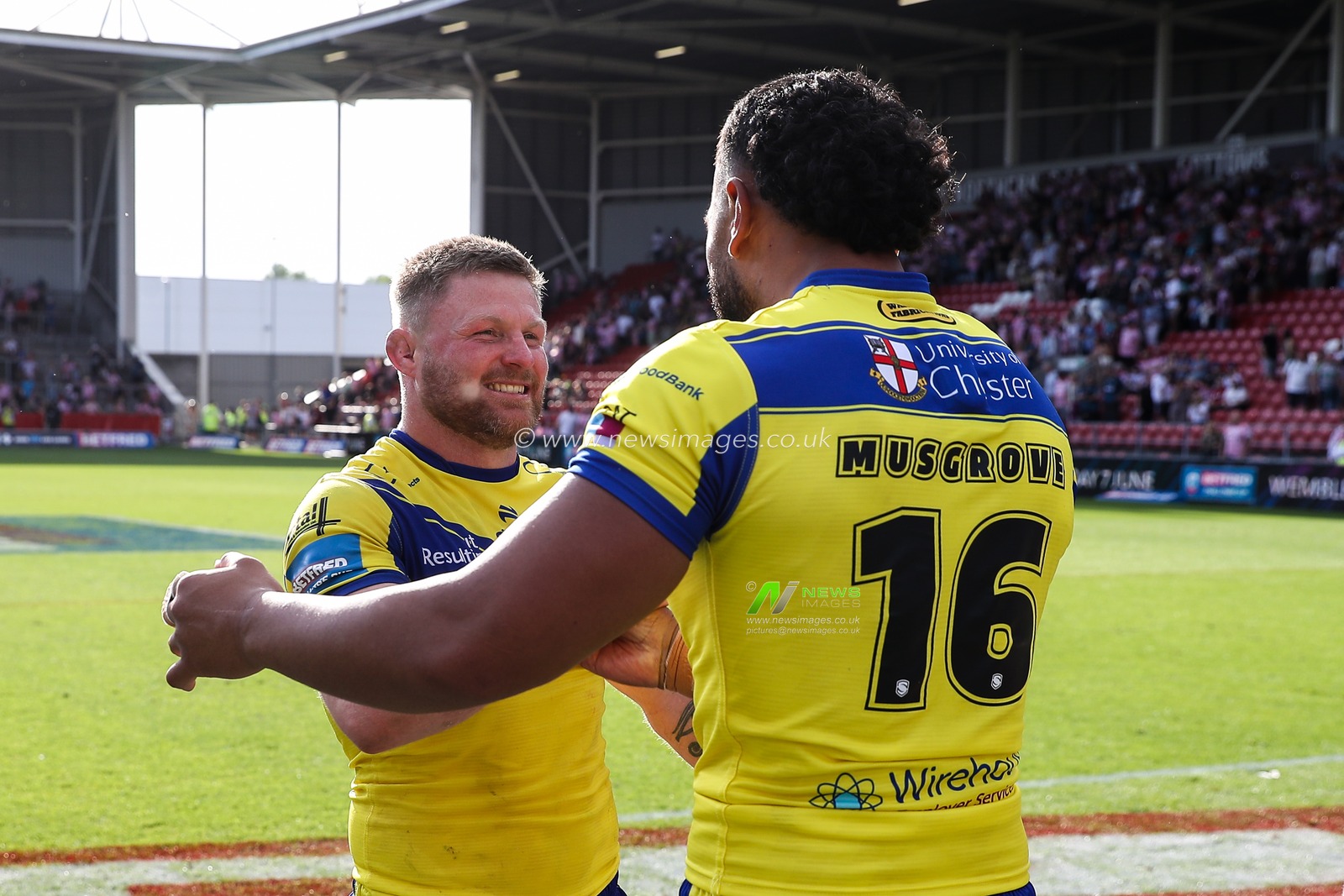Luke Yates of Warrington Wolves and Zane Musgrove of Warrington Wolves embrace after the Betfred Challenge Cup Semi-final match Warrington Wolves vs Leigh Leopards at Totally Wicked Stadium, St Helens, United Kingdom, 11th May 2025

(Photo by Gareth Evans/News Images)