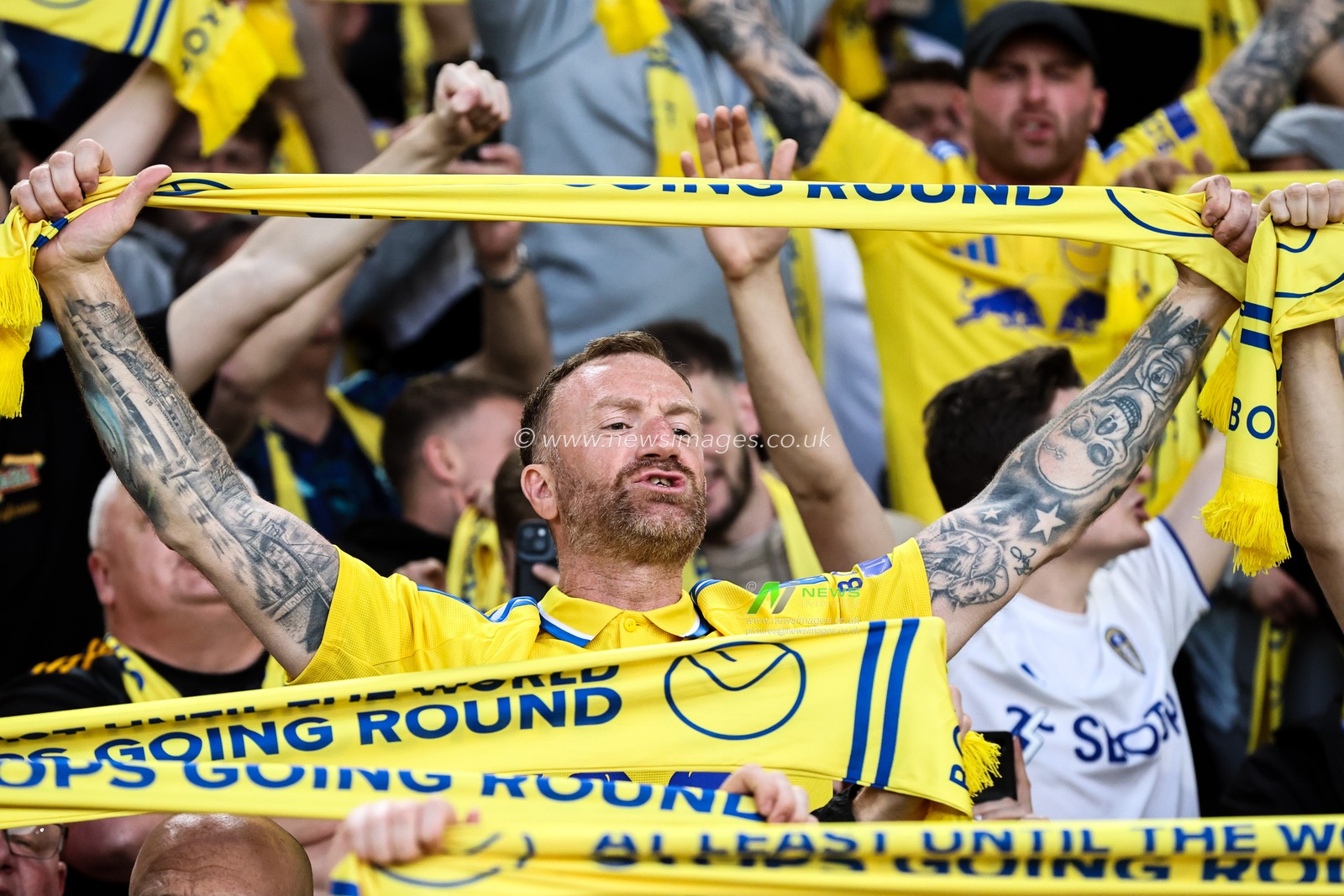 Leeds United fans hold up scarves ahead of the Sky Bet Championship match Leeds United vs Bristol City at Elland Road, Leeds, United Kingdom, 28th April 2025

(Photo by Alfie Cosgrove/News Images)