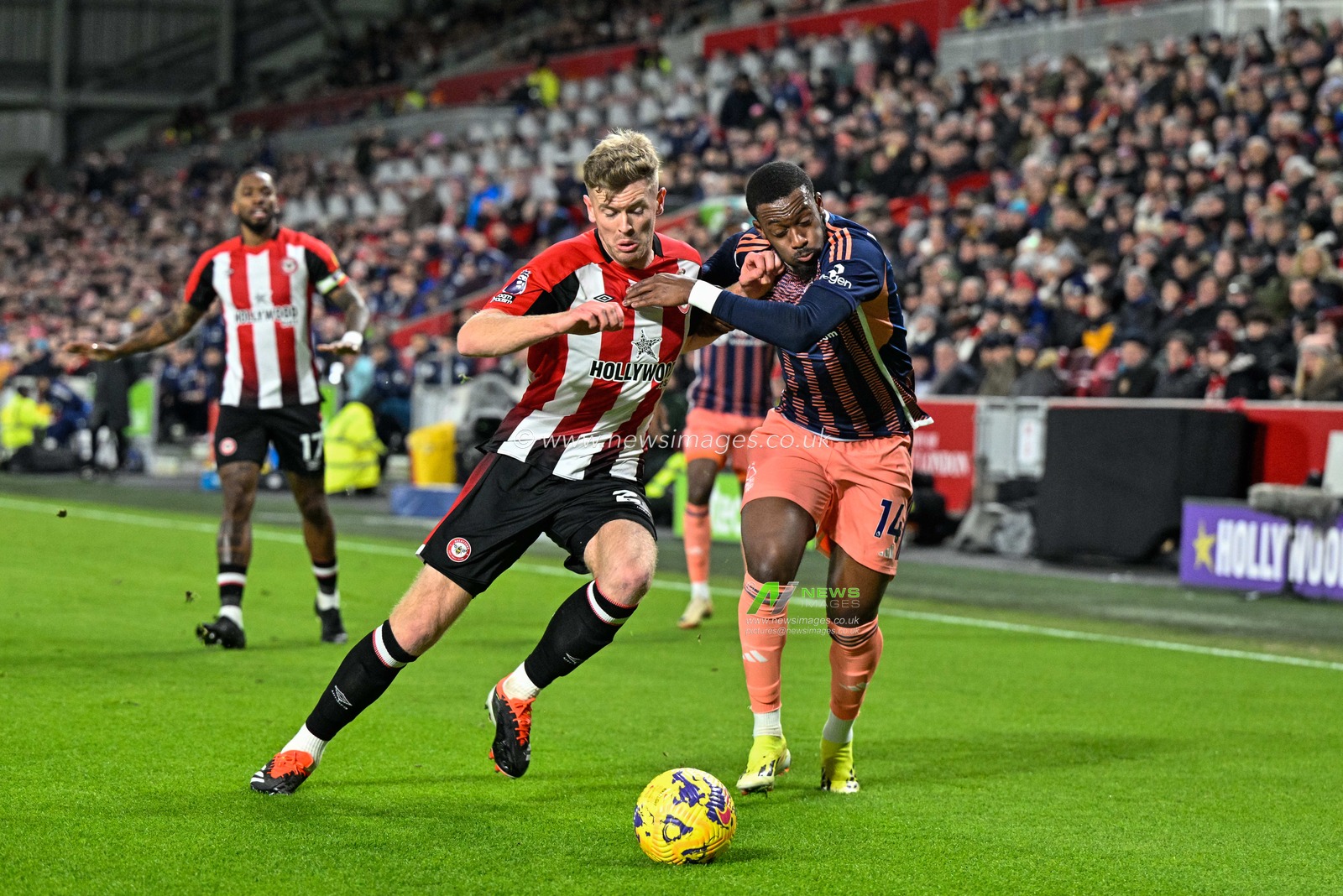 Nathan Collins of Brentford and Callum Hudson-Odoi of Nottingham Forest battle for the ball during the Premier League match Brentford vs Nottingham Forest at The Gtech Community Stadium, London, United Kingdom, 20th January 2024

(Photo by Cody Froggatt/News Images)