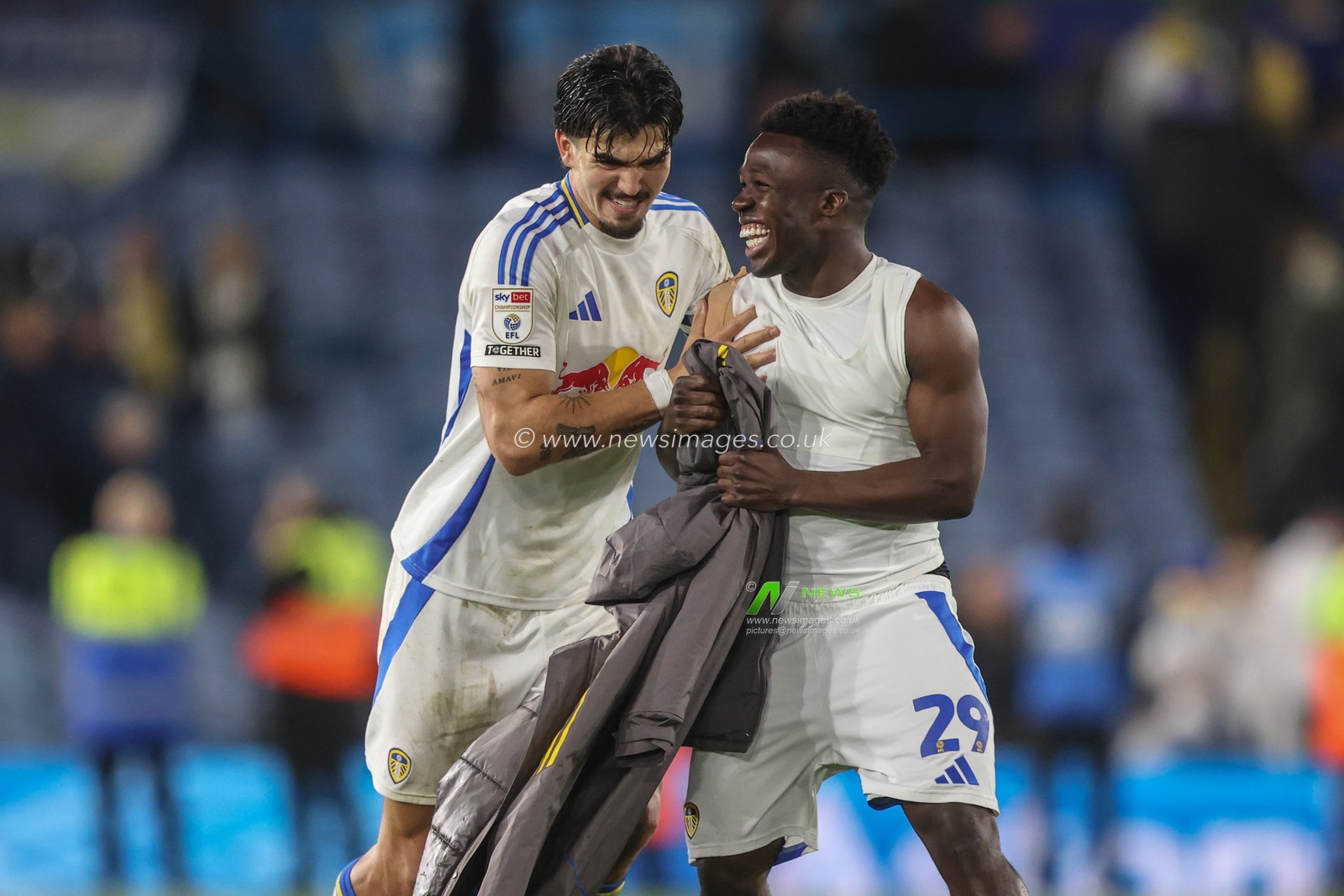 Pascal Struijk of Leeds United pushes Wilfried Gnonto of Leeds United to go celebrate with the fans during the Sky Bet Championship match Leeds United vs Watford at Elland Road, Leeds, United Kingdom, 22nd October 2024

(Photo by Alfie Cosgrove/News Images)