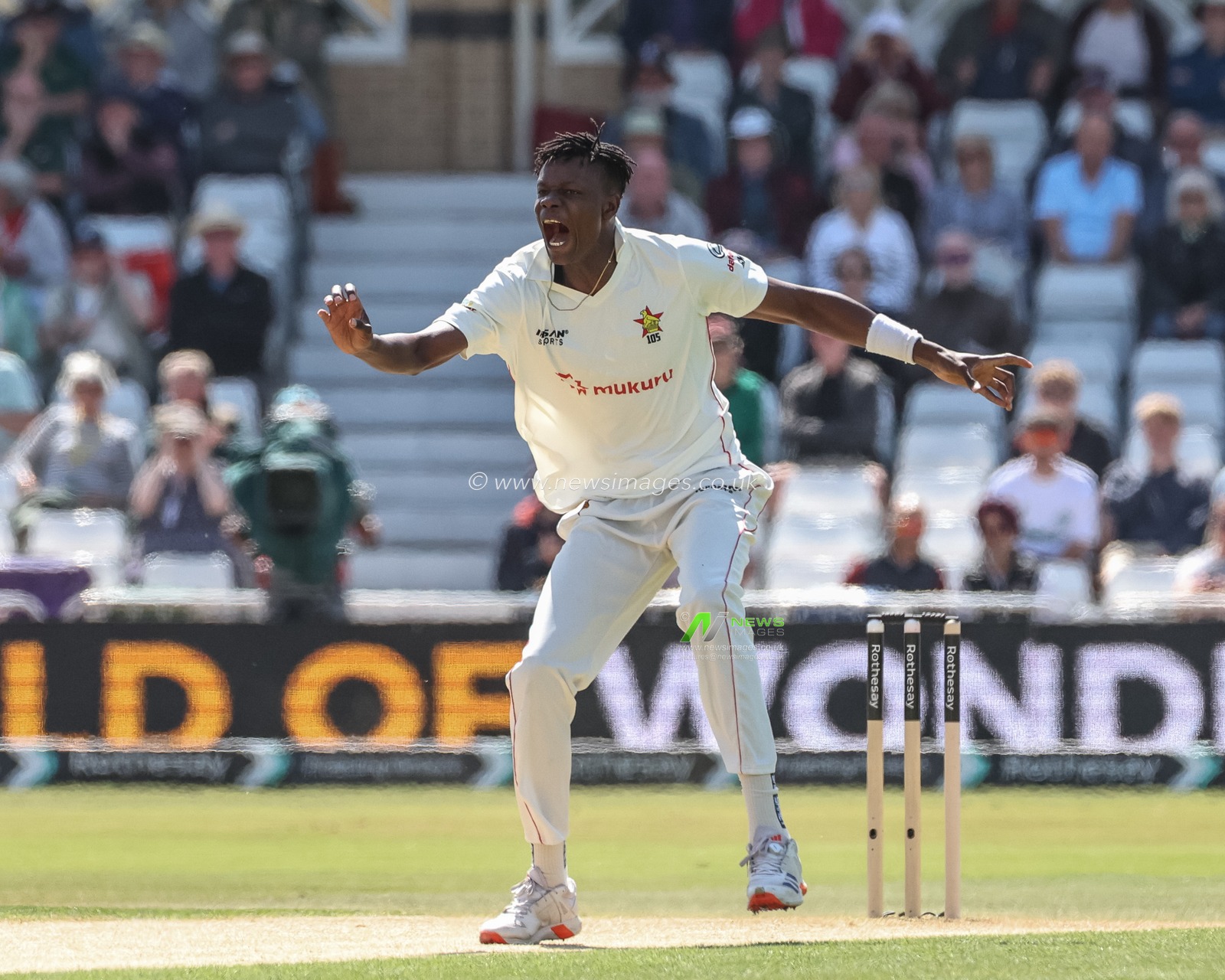 Blessing Muzarabani of Zimbabwe reacts after delivery the ball to Pope during the Rothesay Test Match Day 2 England vs Zimbabwe at Trent Bridge, Nottingham, United Kingdom, 23rd May 2025

(Photo by Mark Cosgrove/News Images)