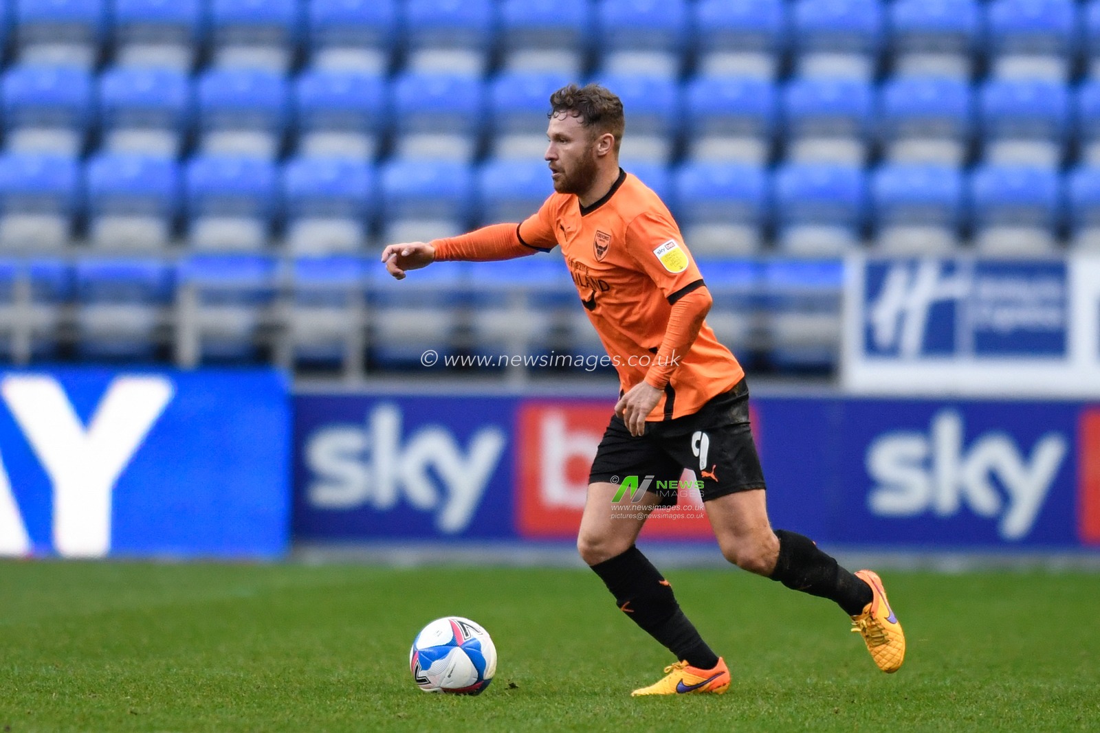 Matty Taylor #9 of Oxford United with the ball