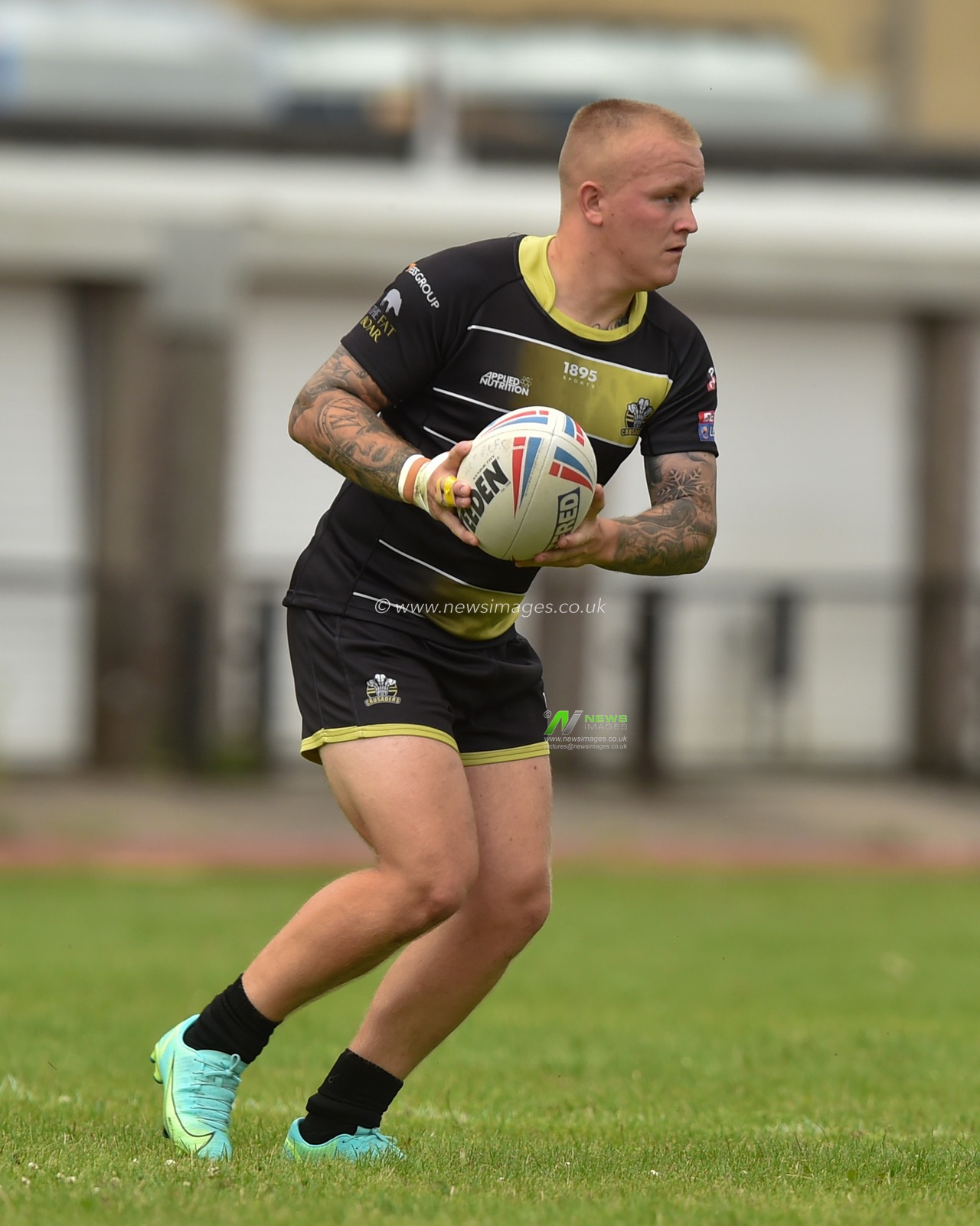 Brad Billsborough of North Wales Crusaders in action during the game