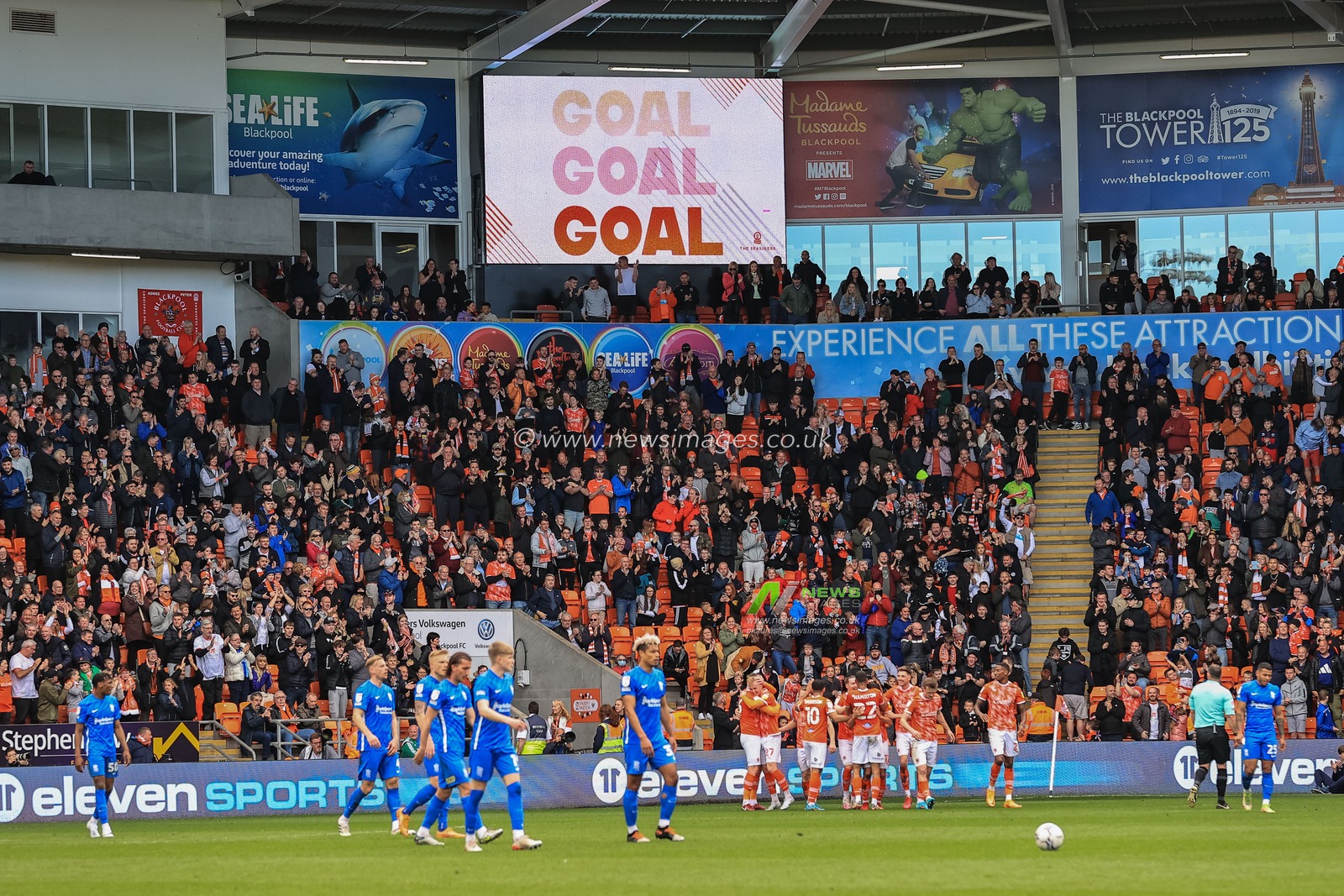 Kenny Dougall #12 of Blackpool celebrates his goal to make it 3-0