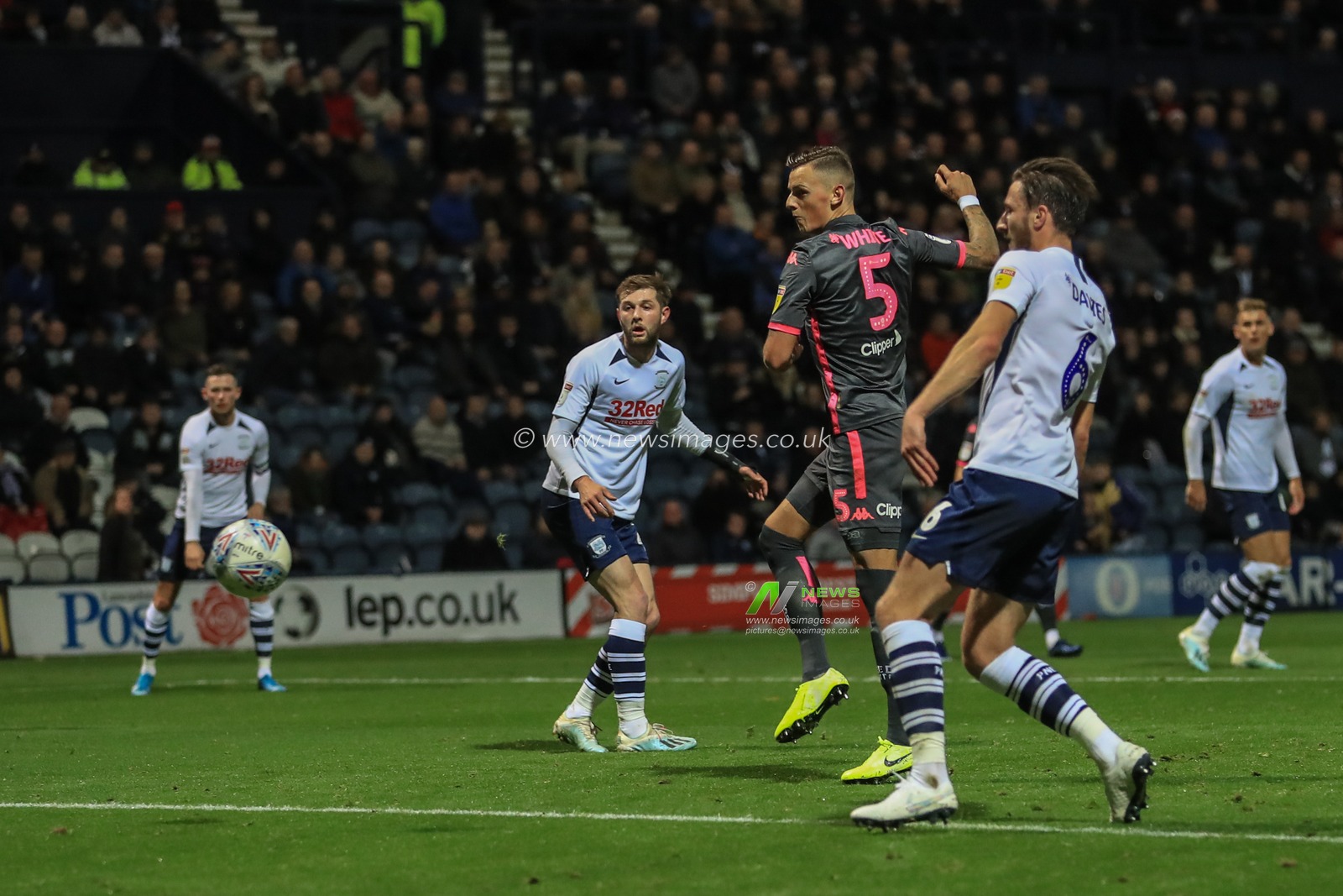22nd October 2019, Deepdale, Preston, England; Sky Bet Championship, Preston North End v Leeds United : Ben White (5) of Leeds United sees his shirt saved by Declan Rudd (1) of Preston North End 

Credit: Mark Cosgrove/News Images