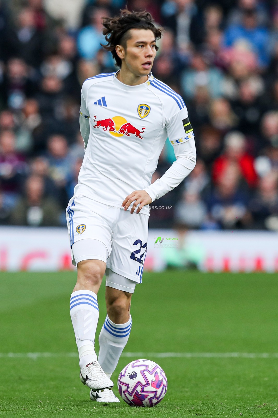 Ao Tanaka of Leeds United with ball at his feet during the Premier League match Burnley vs Leeds United at Turf Moor, Burnley, United Kingdom, 18th October 2025

(Photo by Jorge Horsted/News Images)