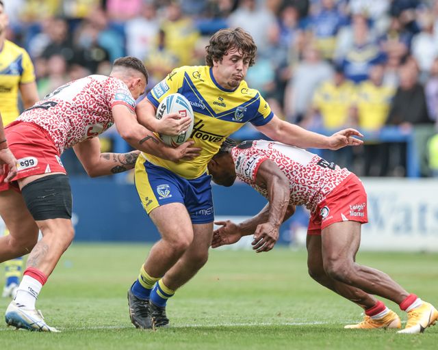 Max Wood of Warrington Wolves is tackled by Edwin Ipape of Leigh Leopards during the Betfred Super League Round 25 match Warrington Wolves vs Leigh Leopards at Halliwell Jones Stadium, Warrington, United Kingdom, 6th September 2025

(Photo by Mark Cosgrove/News Images)
