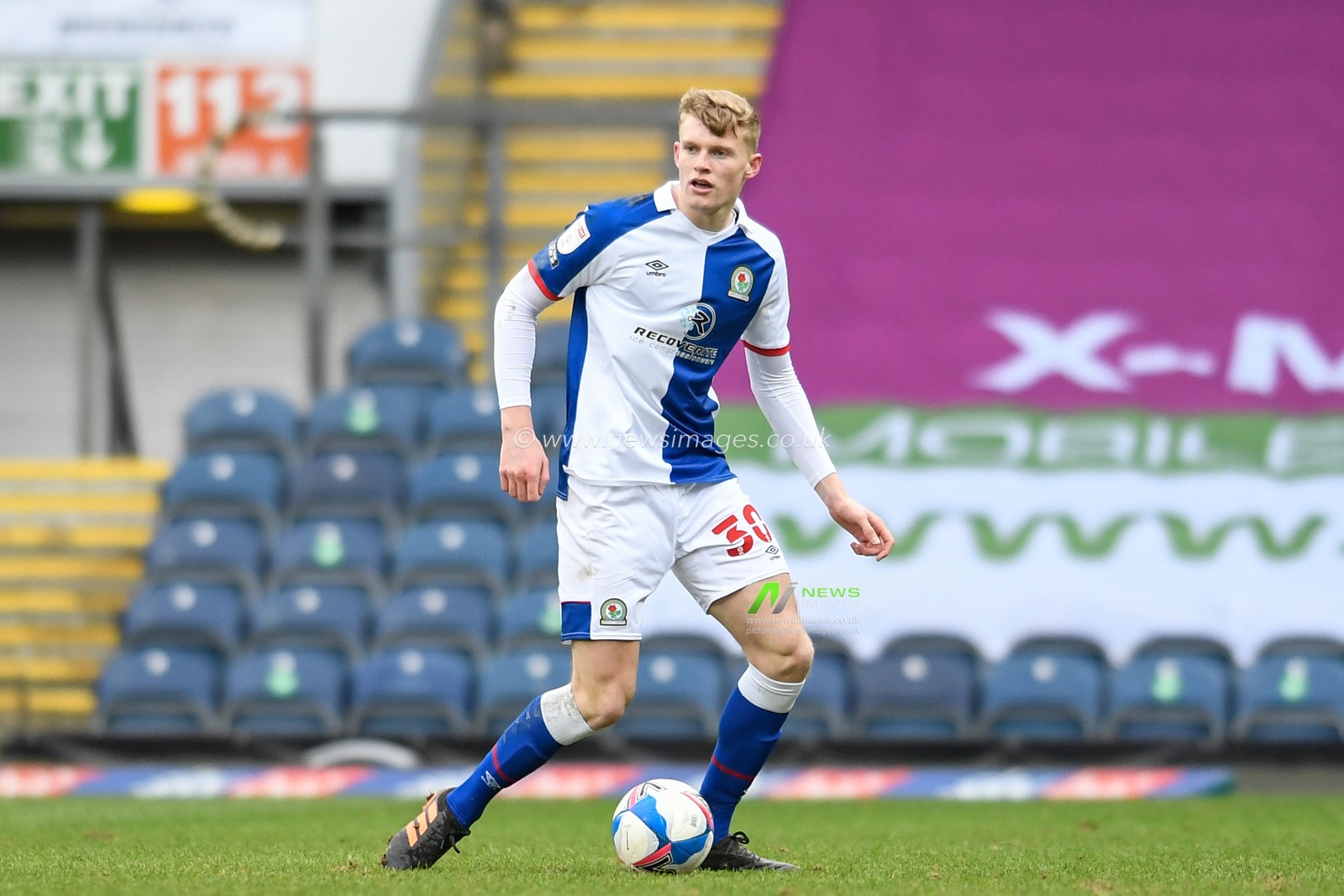 Jarrad Branthwaite #30 of Blackburn Rovers looks for a passing option