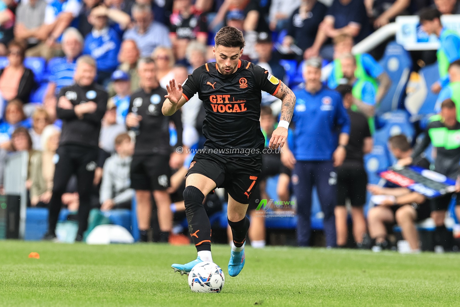 Owen Dale #7 of Blackpool breaks with the ball