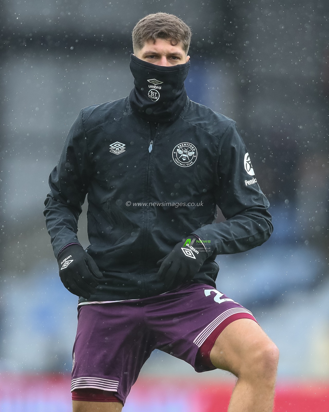 Vitaly Janelt of Brentford wraps up in the rain in the pregame warmup session during the Premier League match Crystal Palace vs Brentford at Selhurst Park, London, United Kingdom, 26th January 2025

(Photo by Izzy Poles/News Images)