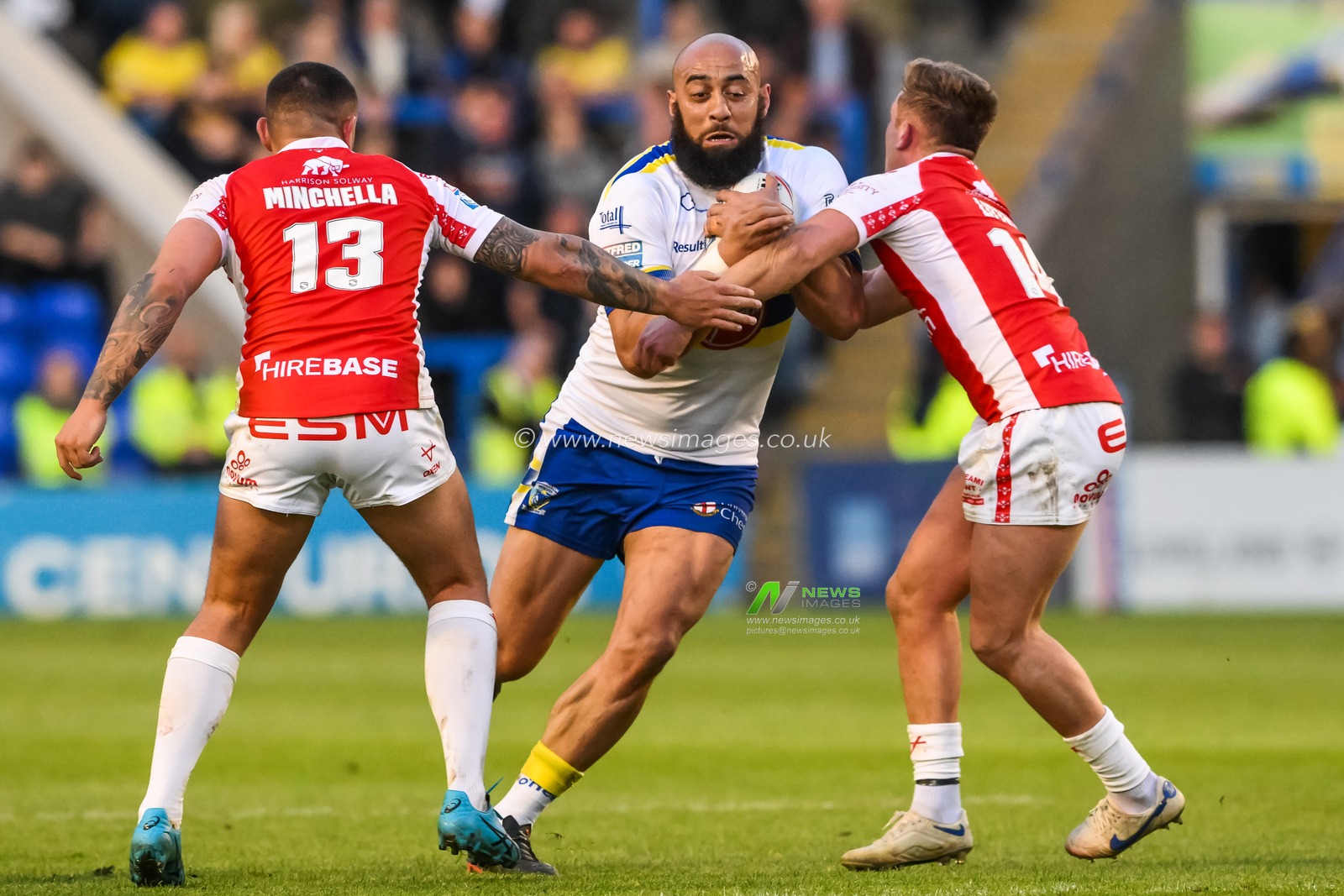 Sam Kasiano #14 of Warrington Wolves is tackled by Jez Litten #14 of Hull KR during the Betfred Super League Round 12 match Warrington Wolves vs Hull KR at Halliwell Jones Stadium, Warrington, United Kingdom, 12th May 2023

(Photo by Craig Thomas/News Images)