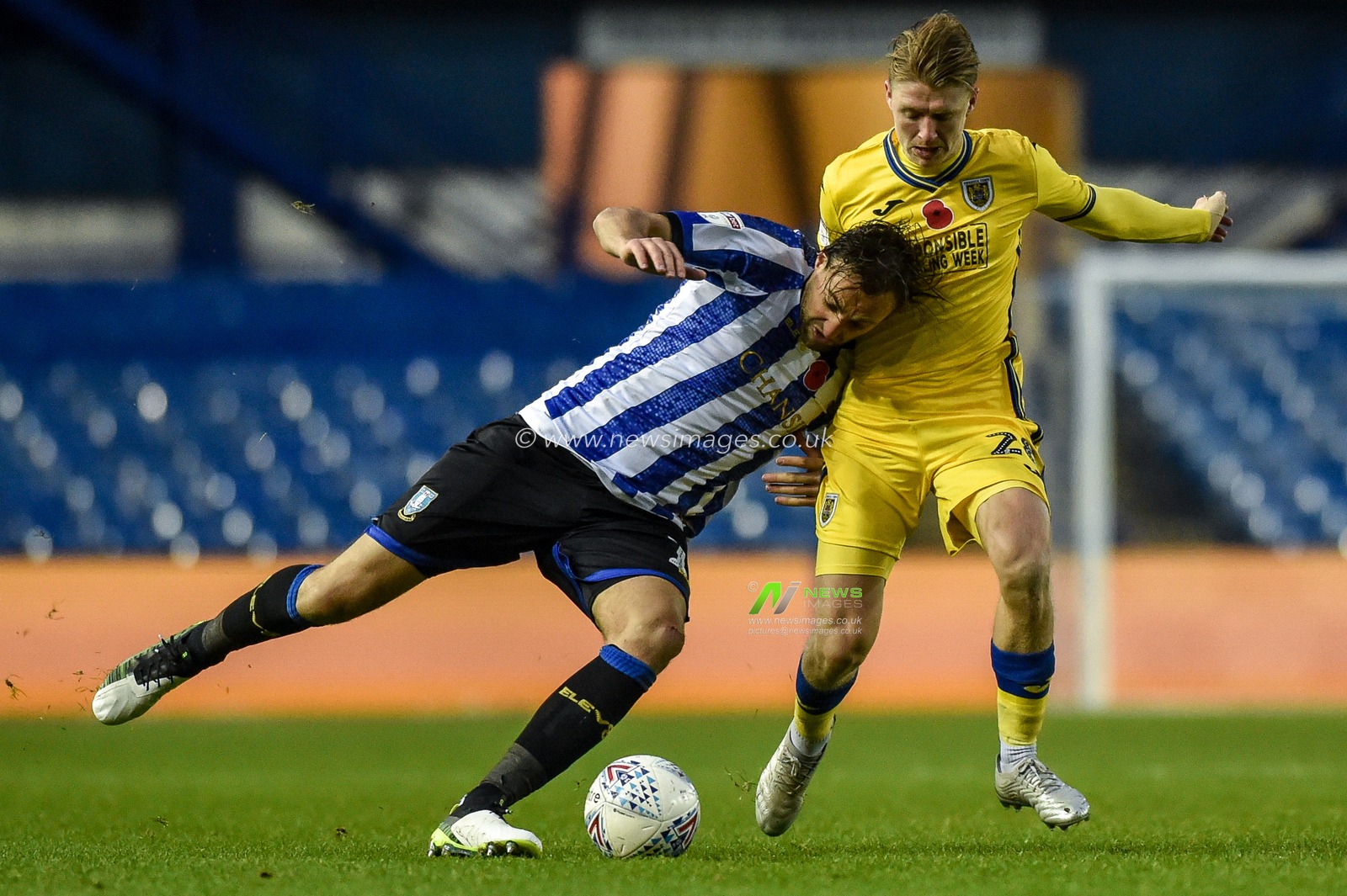 9th November 2019, Hillsborough, Sheffield, England; Sky Bet Championship, Sheffield Wednesday v Swansea City : Atdhe Nuhiu (17) of Sheffield Wednesday  and George Byers (28) of Swansea City challenge for a ball in the 2-2 encounter.

Credit: Dean Williams/News Images