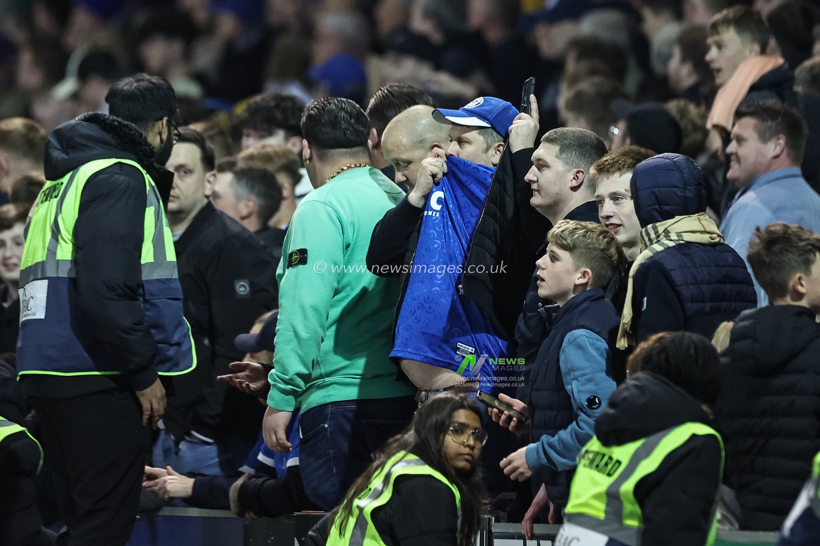 A  Portsmouth fan kisses his top as they win the league during the Sky Bet League 1 match Portsmouth vs Barnsley at Fratton Park, Portsmouth, United Kingdom, 16th April 2024

(Photo by Mark Cosgrove/News Images)