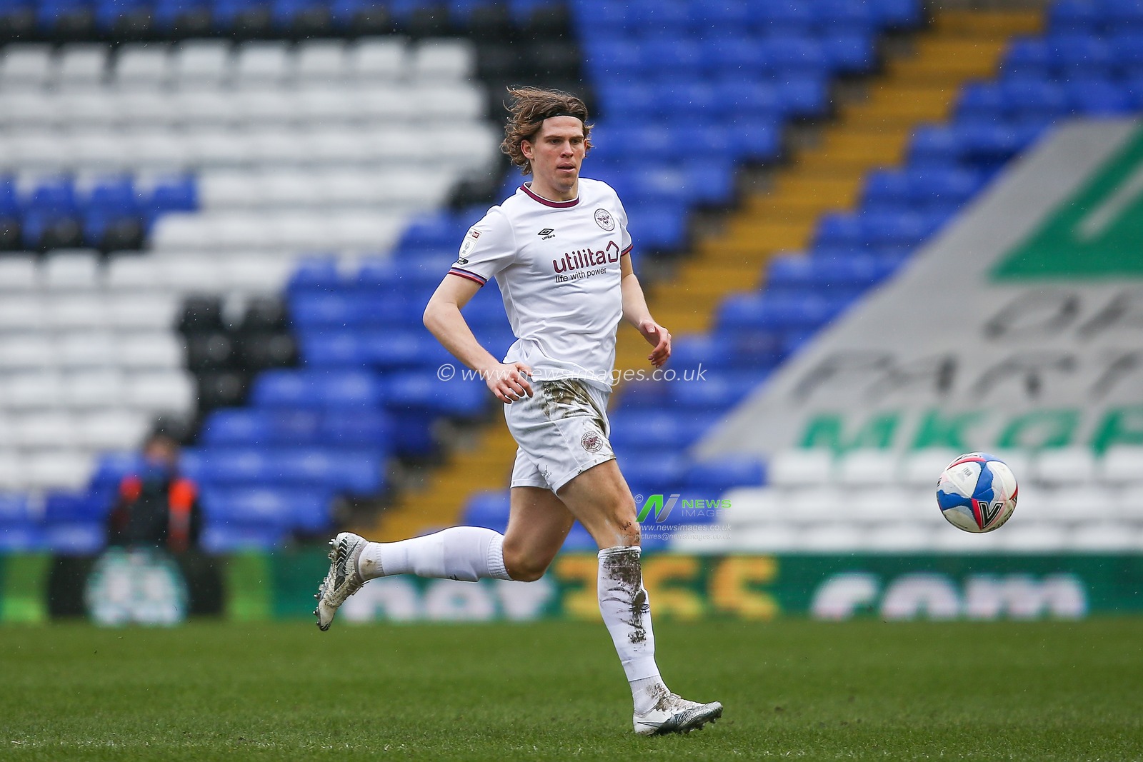 Mads Bech Sorensen #29 of Brentford dribbles the ball