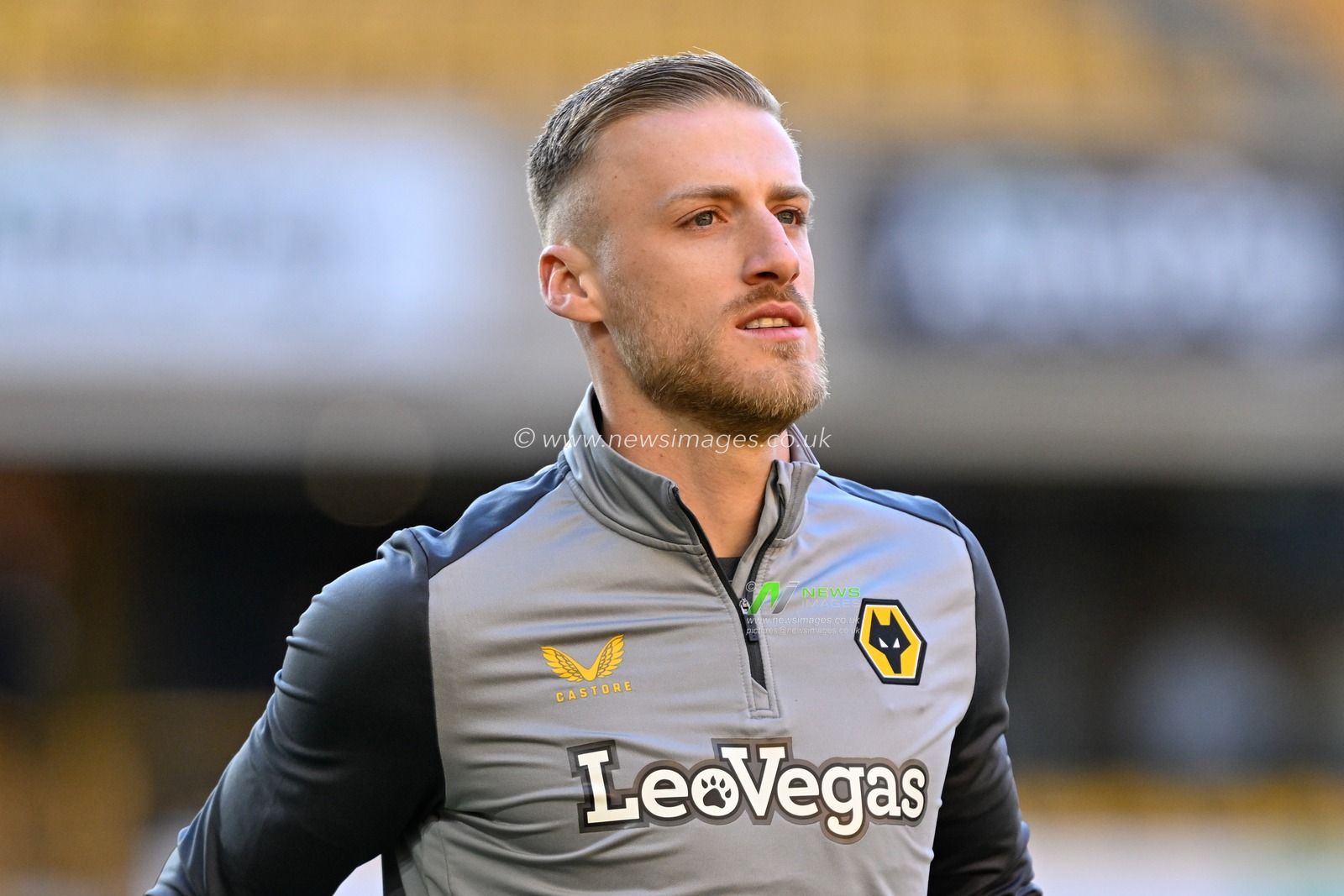 Daniel Bentley of Wolverhampton Wanderers warms up ahead of the match, during the Premier League match Wolverhampton Wanderers vs Arsenal at Molineux, Wolverhampton, United Kingdom, 20th April 2024

(Photo by Cody Froggatt/News Images)