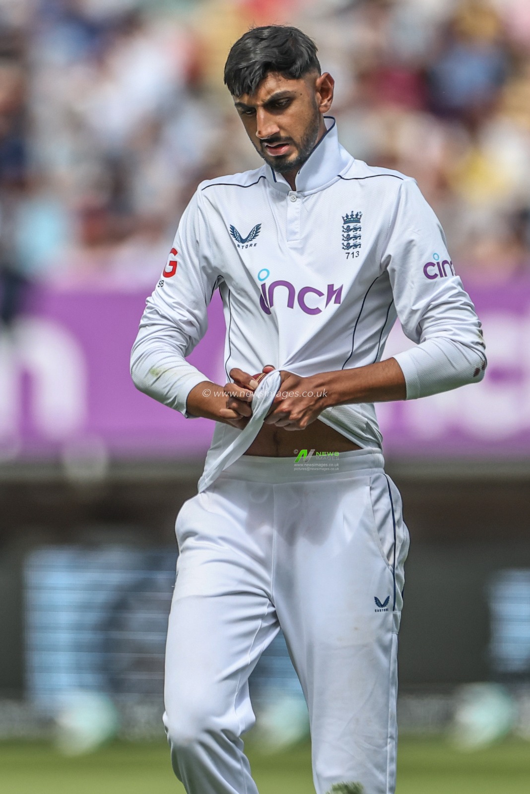 Shoaib Bashir of England polishes the ball during the 3rd Rothesay Test Match Day One match England vs West Indies at Edgbaston, Birmingham, United Kingdom, 26th July 2024

(Photo by Mark Cosgrove/News Images)
