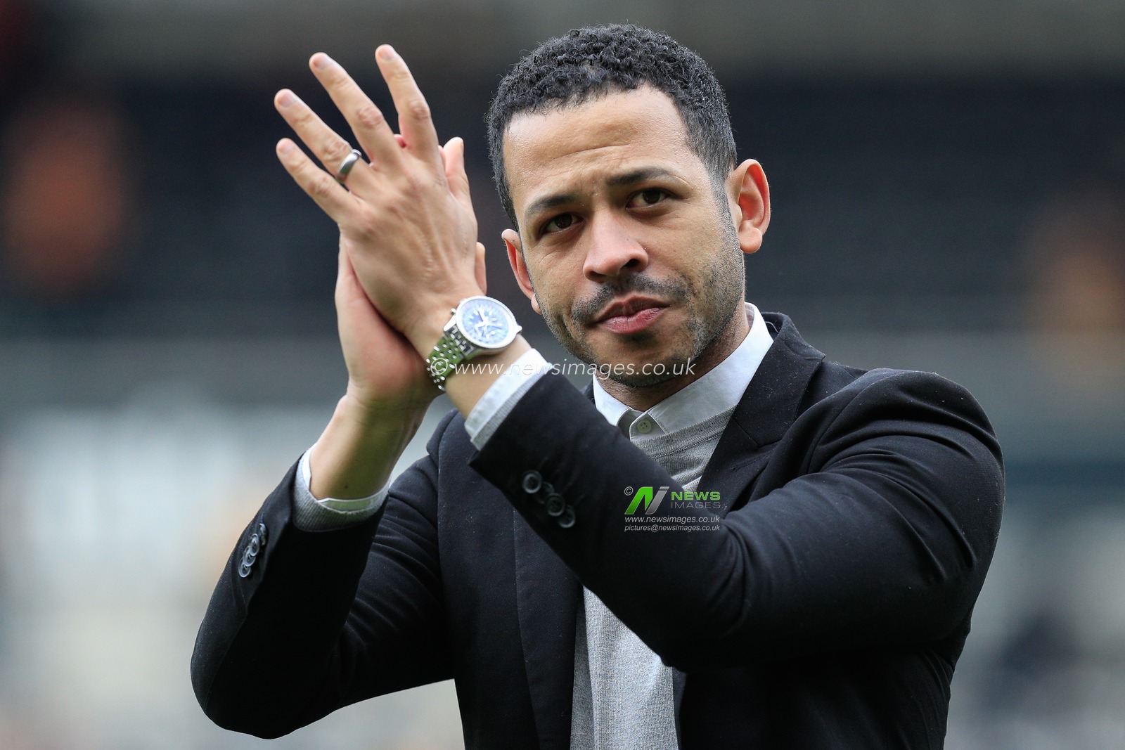Liam Rosenior manager of Hull City claps his hands and applauds the supporters at full-time after the Sky Bet Championship match Hull City vs Watford at MKM Stadium, Hull, United Kingdom, 22nd April 2023

(Photo by James Heaton/News Images)