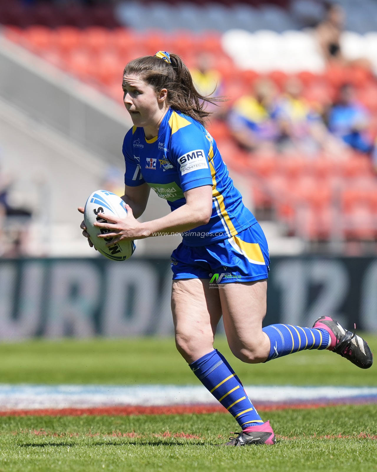 Izzy Northrop of Leeds Rhinos runs with the ball during the Betfred Women's Challenge Cup Semi-Final match Leeds Rhinos vs Wigan Warriors at Totally Wicked Stadium, St Helens, United Kingdom, 19th May 2024

(Photo by Steve Flynn/News Images)