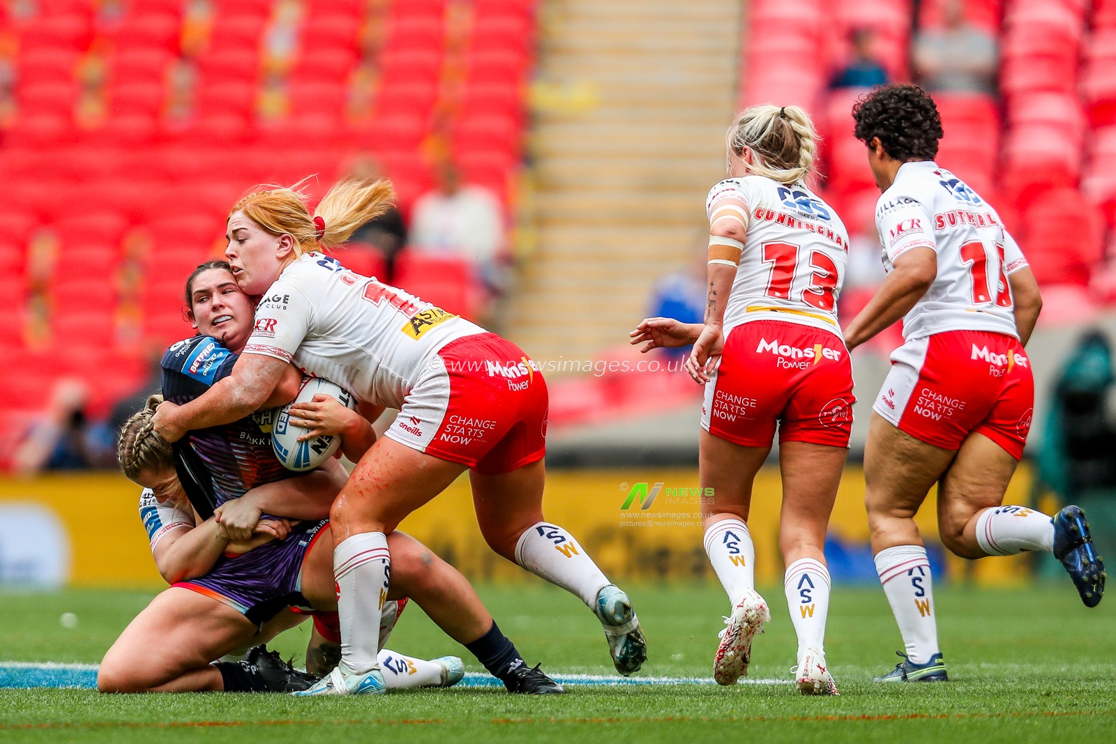 Megan Williams of Wigan Warriors is tackled during the Betfred Women's Challenge Cup Final St Helens vs Wigan Warriors at Wembley Stadium, London, United Kingdom, 7th June 2025

(Photo by Izzy Poles/News Images)