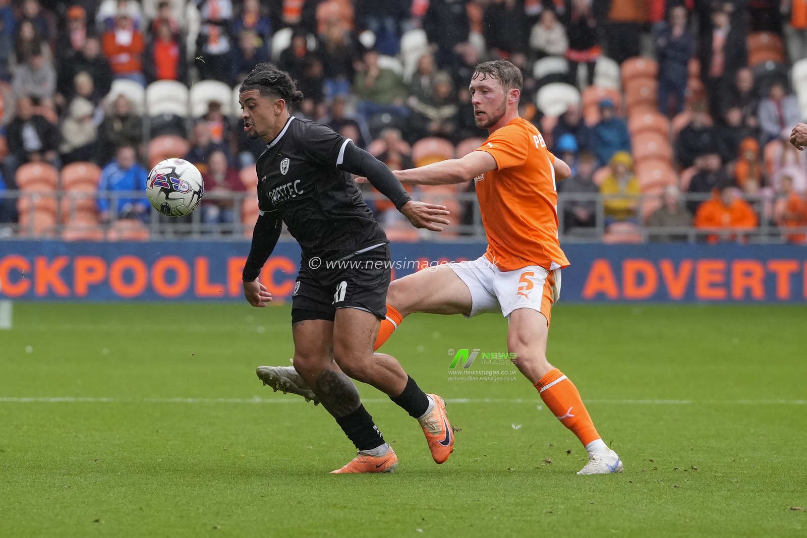 Matthew Pennington #5 of Blackpool competes for the ball with Josh Gordon #10 of Burton Albion during the Sky Bet League 1 match Blackpool vs Burton Albion at Bloomfield Road, Blackpool, United Kingdom, 5th August 2023

(Photo by Steve Flynn/News Images)