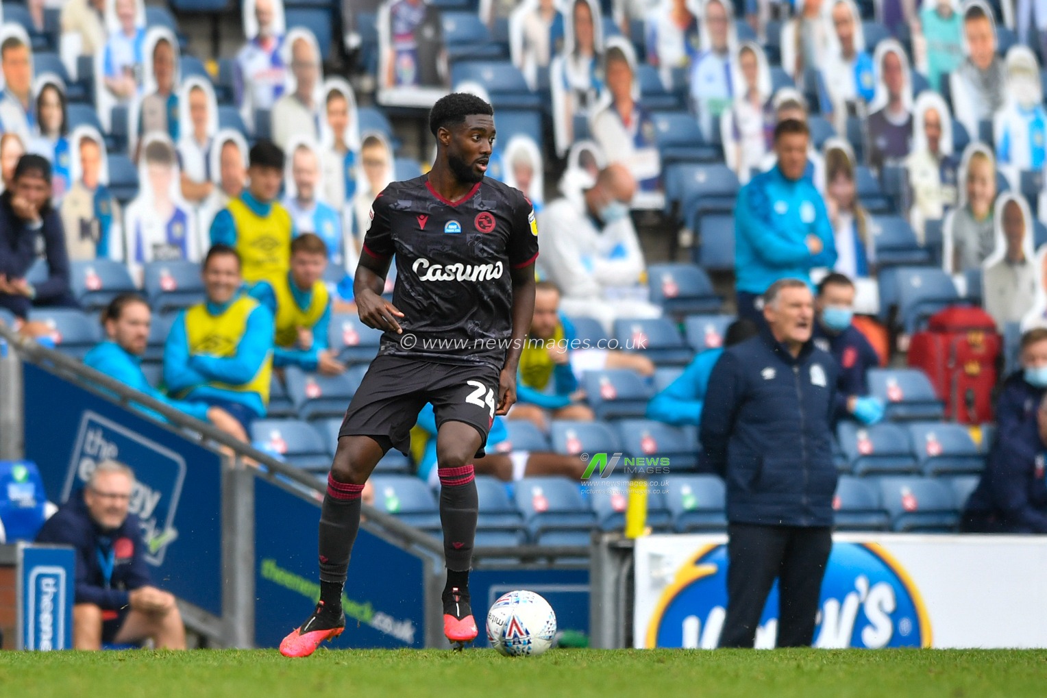 Tyler Blackett (24) of Reading looks for a pass