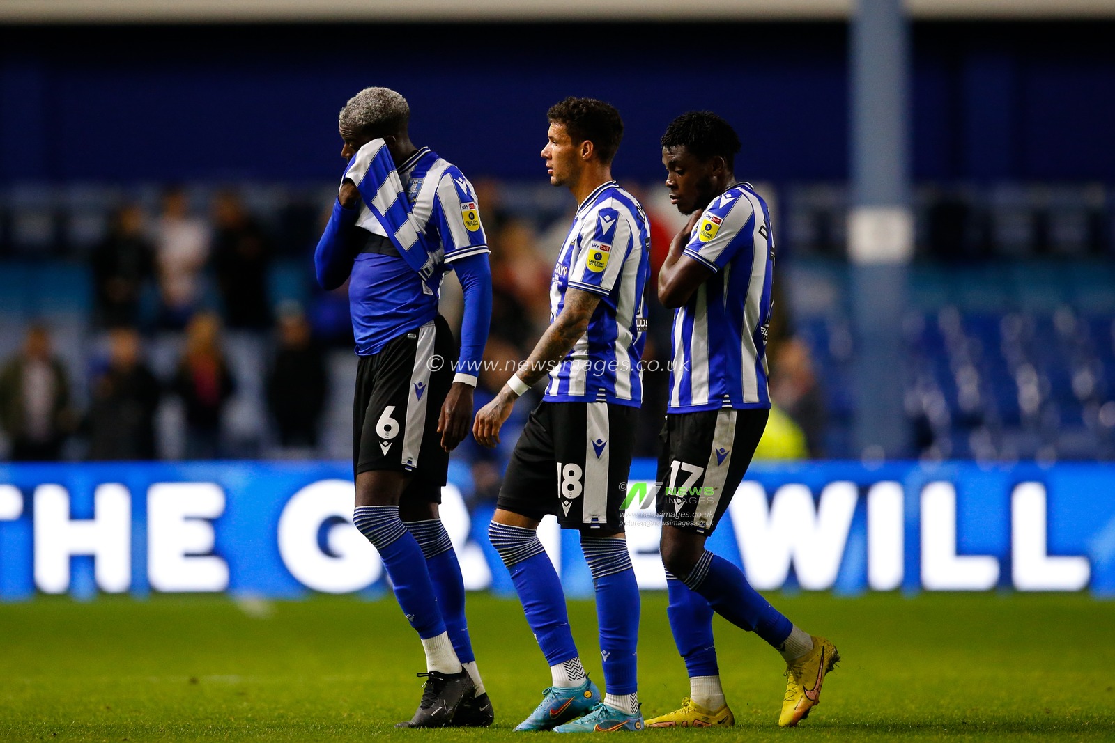 Players of Sheffield Wednesday look dejected after losing the Papa John's Trophy match Sheffield Wednesday vs Burton Albion at Hillsborough, Sheffield, United Kingdom, 20th September 2022

(Photo by Ben Early/News Images)