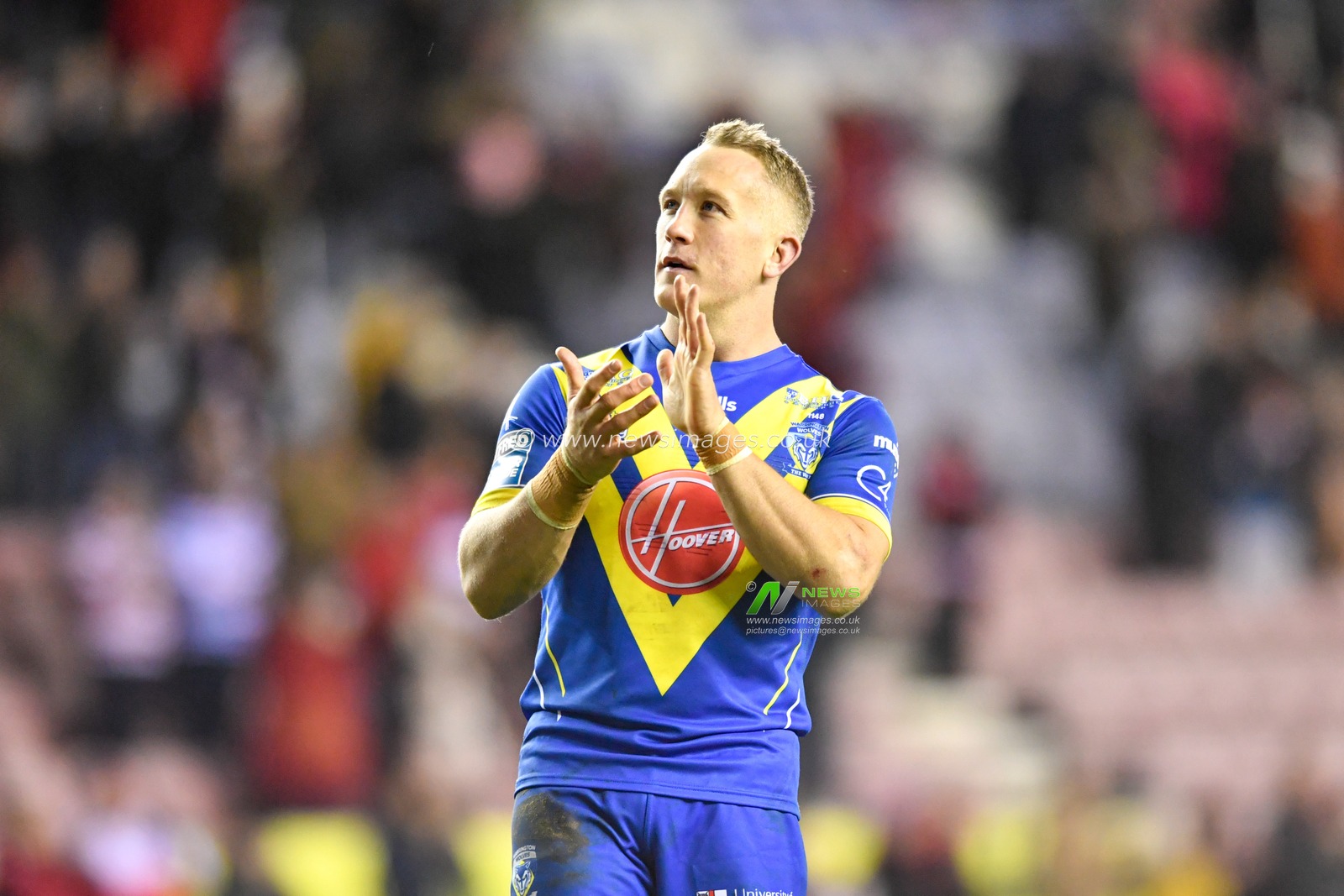 30th January 2020, DW Stadium, Wigan, England; Betfred Super League, Wigan Warriors v Warrington Wolves : Jason Clark (14) of Warrington Wolves applauds the travelling supporters at the end of the game