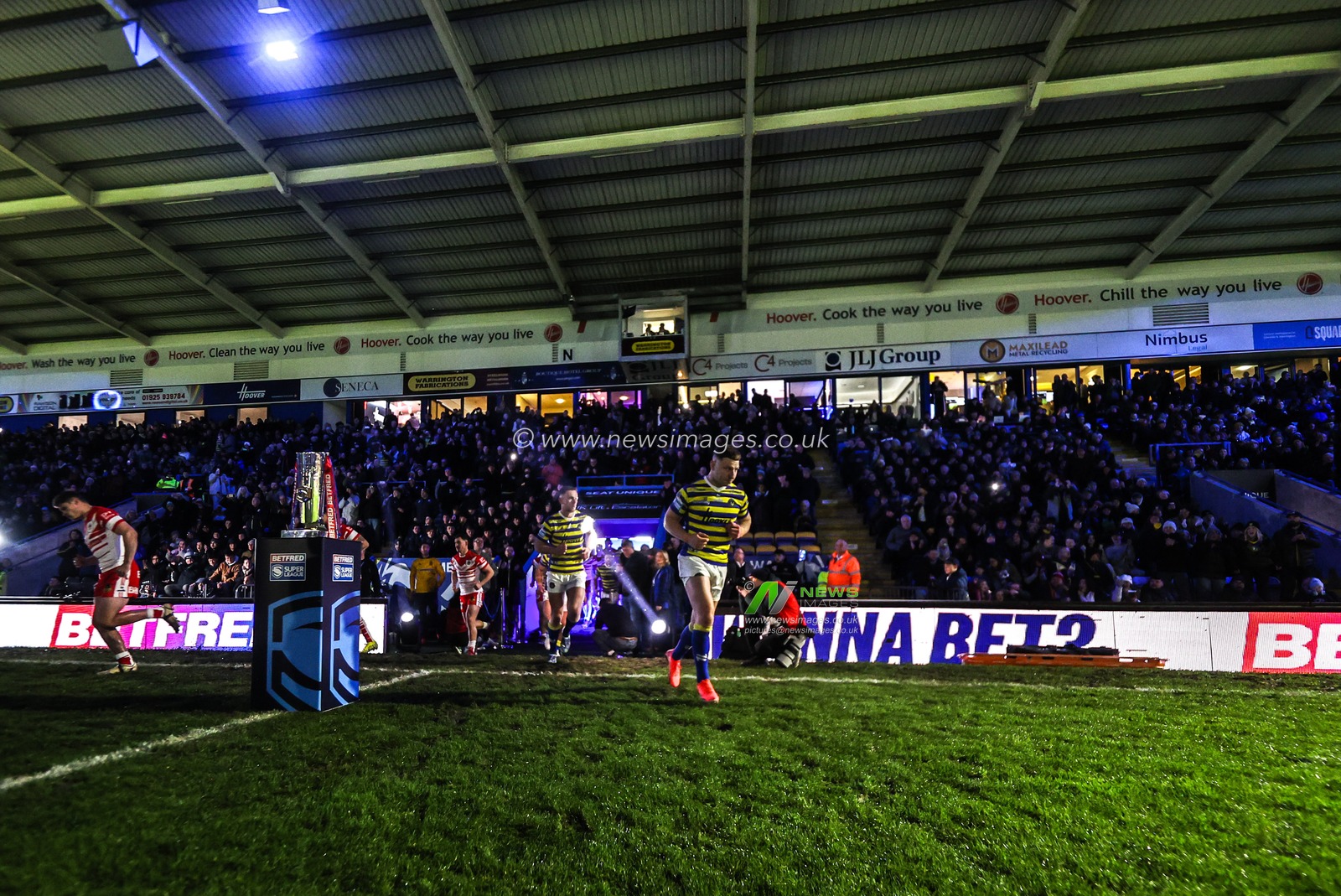 George Williams of Warrington Wolves leas his team out for  the first game of the season during the Betfred Super League Round 1 match Warrington Wolves vs St Helens at The Halliwell Jones Stadium, Warrington, United Kingdom on 13 February 2026

(Photo by Alfie Cosgrove/News Images)