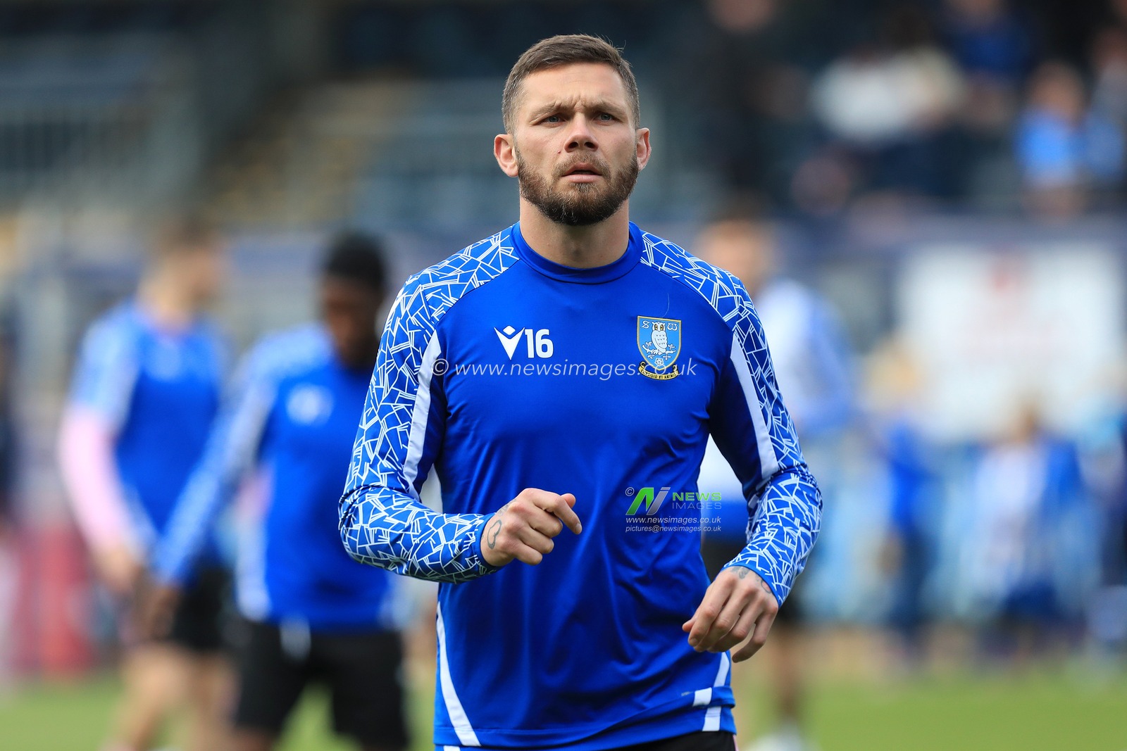 Harlee Dean #16 of Sheffield Wednesday warms up prior to kick off.