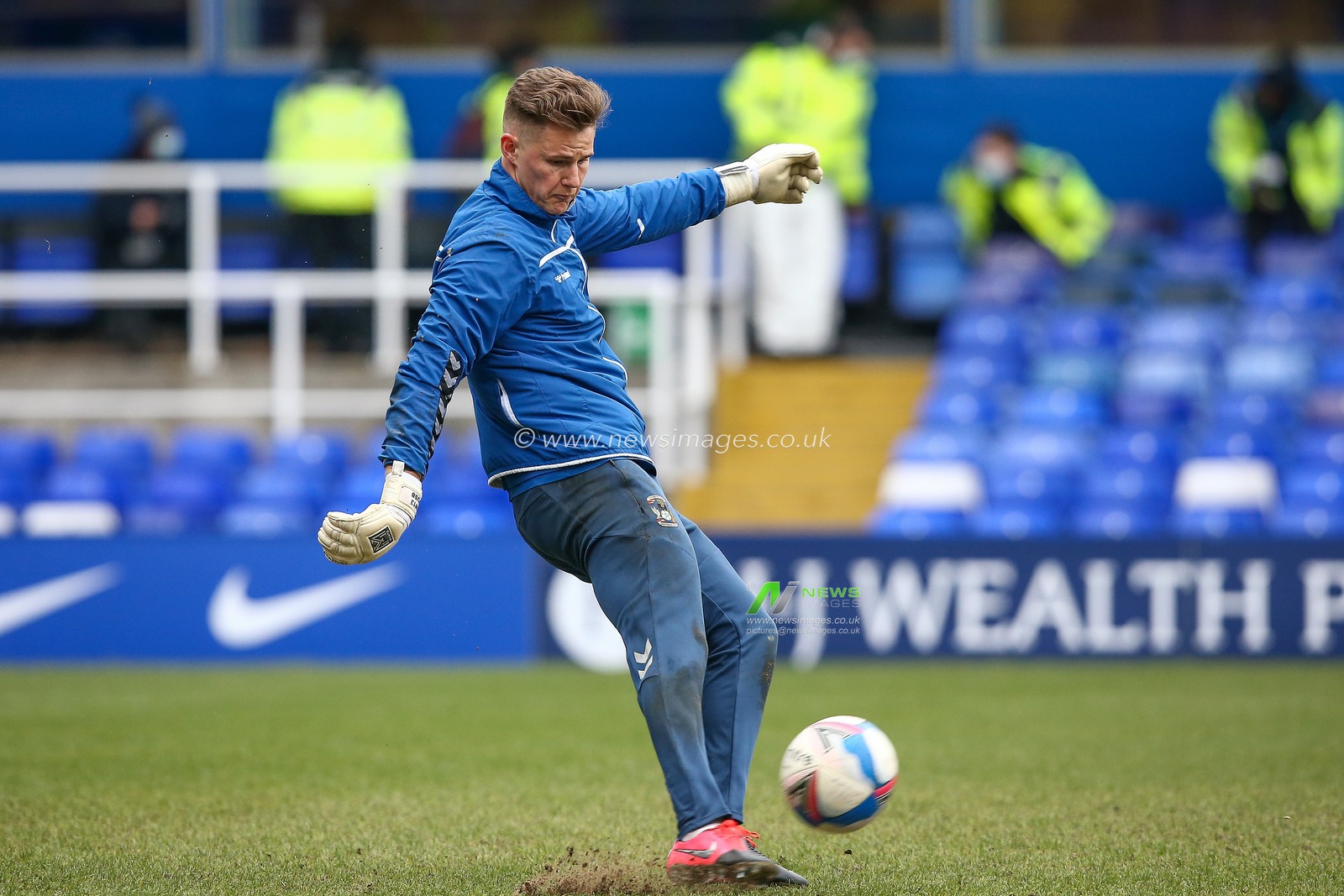 Ben Wilson #13 of Coventry City warming up ahead of the game against Wycombe Wanderers