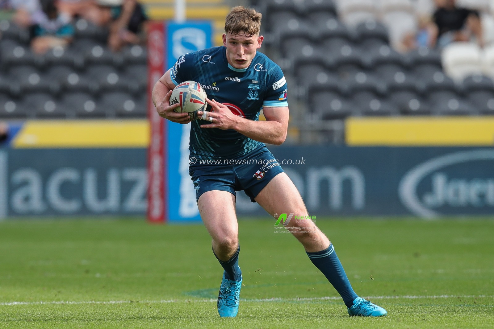 Matty Nicholson #12 of Warrington Wolves runs with the ball during the Betfred Super League Round 23 match Hull FC vs Warrington Wolves at MKM Stadium, Hull, United Kingdom, 26th August 2023

(Photo by James Heaton/News Images)