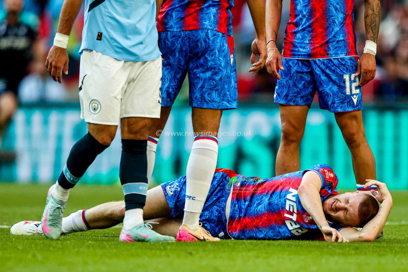 Adam Wharton of Crystal Palace goes down with injury during the Emirates FA Cup Final match Crystal Palace vs Manchester City at Wembley Stadium, London, United Kingdom, 17th May 2025

(Photo by Alfie Cosgrove/News Images)