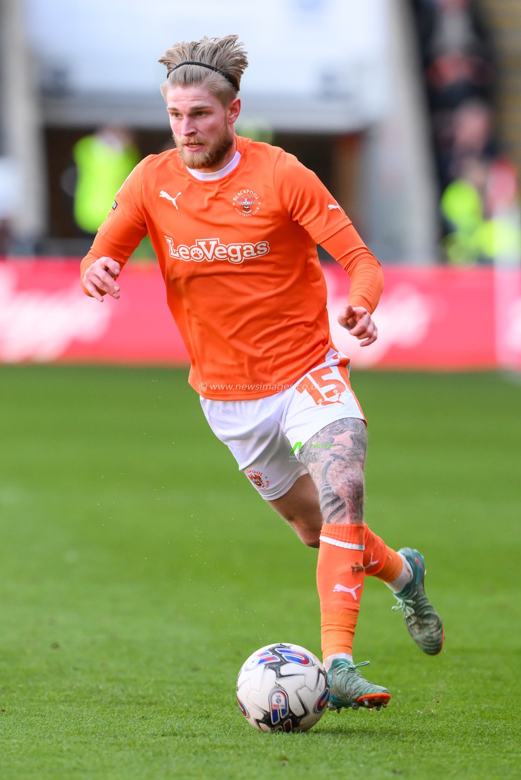 Hayden Coulson of Blackpool makes a break with the ball during the Sky Bet League 1 match Blackpool vs Barnsley at Bloomfield Road, Blackpool, United Kingdom, 20th April 2024

(Photo by Craig Thomas/News Images)