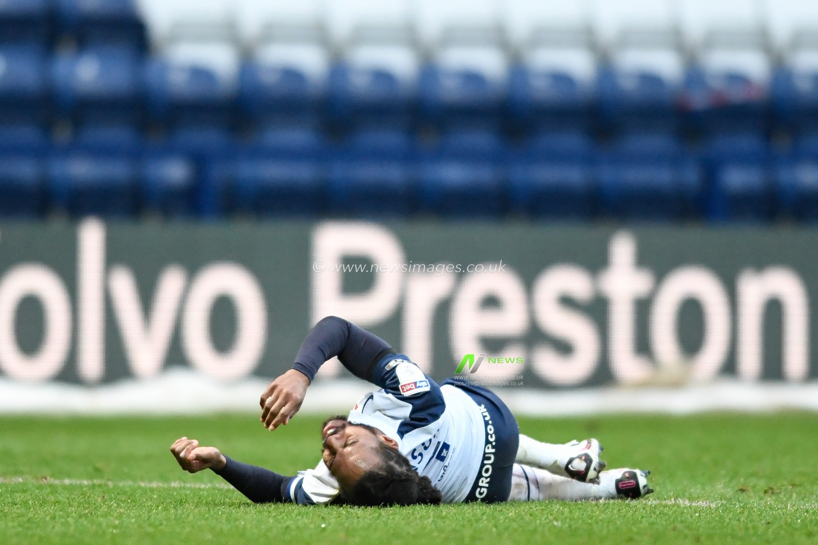Daniel Johnson #11 of Preston North End on the ground injured