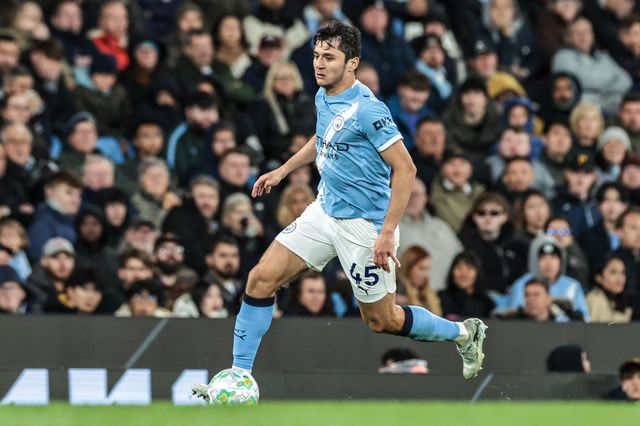 Abdukodir Khusanov of Manchester City breaks with the ball during the Premier League match Manchester City vs Crystal Palace at Etihad Stadium, Manchester, United Kingdom on 13 May 2026

(Photo by Mark Cosgrove/News Images)