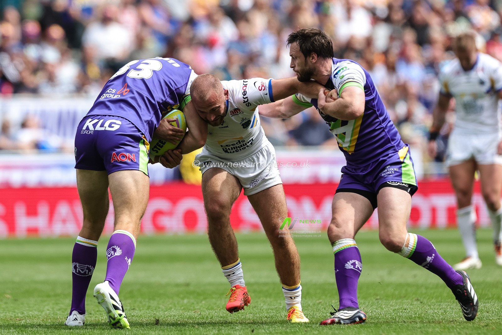 Jarrod O'Connor of Leeds Rhinos is tackled by Jack Ormondroyd of Bradford Bulls during the Betfred Super League Magic Weekend match Leeds Rhinos vs Bradford Bulls at Hill Dickinson Stadium, Liverpool, United Kingdom on 05 July 2026

(Photo by Mark Cosgrove/News Images)