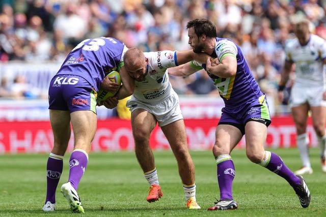 Jarrod O'Connor of Leeds Rhinos is tackled by Jack Ormondroyd of Bradford Bulls during the Betfred Super League Magic Weekend match Leeds Rhinos vs Bradford Bulls at Hill Dickinson Stadium, Liverpool, United Kingdom on 05 July 2026

(Photo by Mark Cosgrove/News Images)