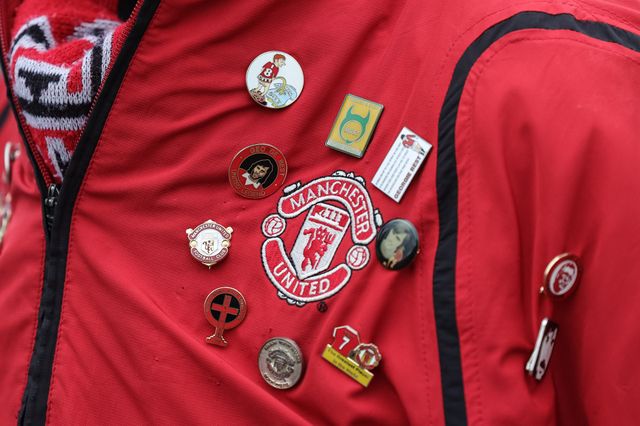 Manchester United fan with pin badges on his coat during the Premier League match Manchester United vs Liverpool at Old Trafford, Manchester, United Kingdom on 03 May 2026

(Photo by Mark Cosgrove/News Images)